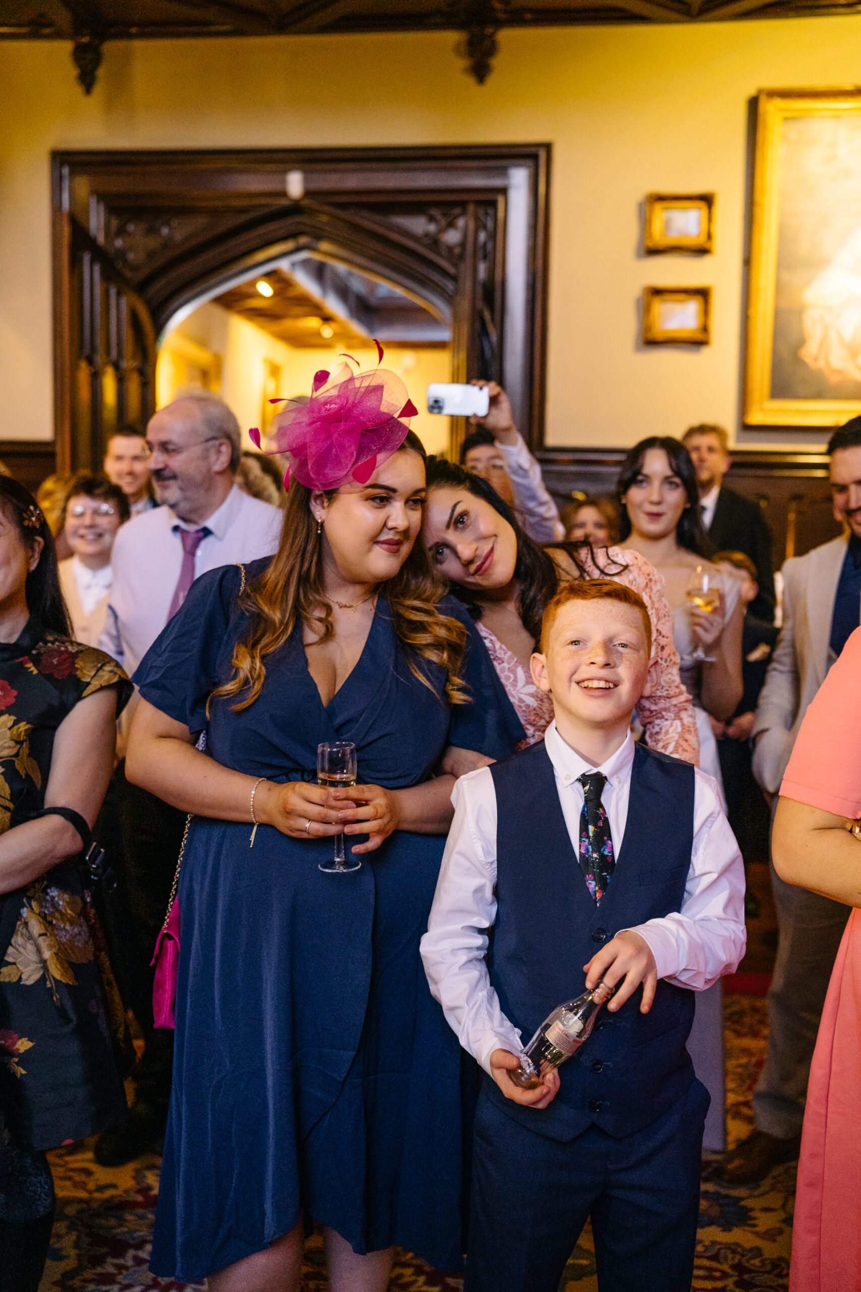 Wedding speeches during a same-sex wedding reception at Markree Castle, Ireland, featuring emotional and joyful moments shared by family and friends