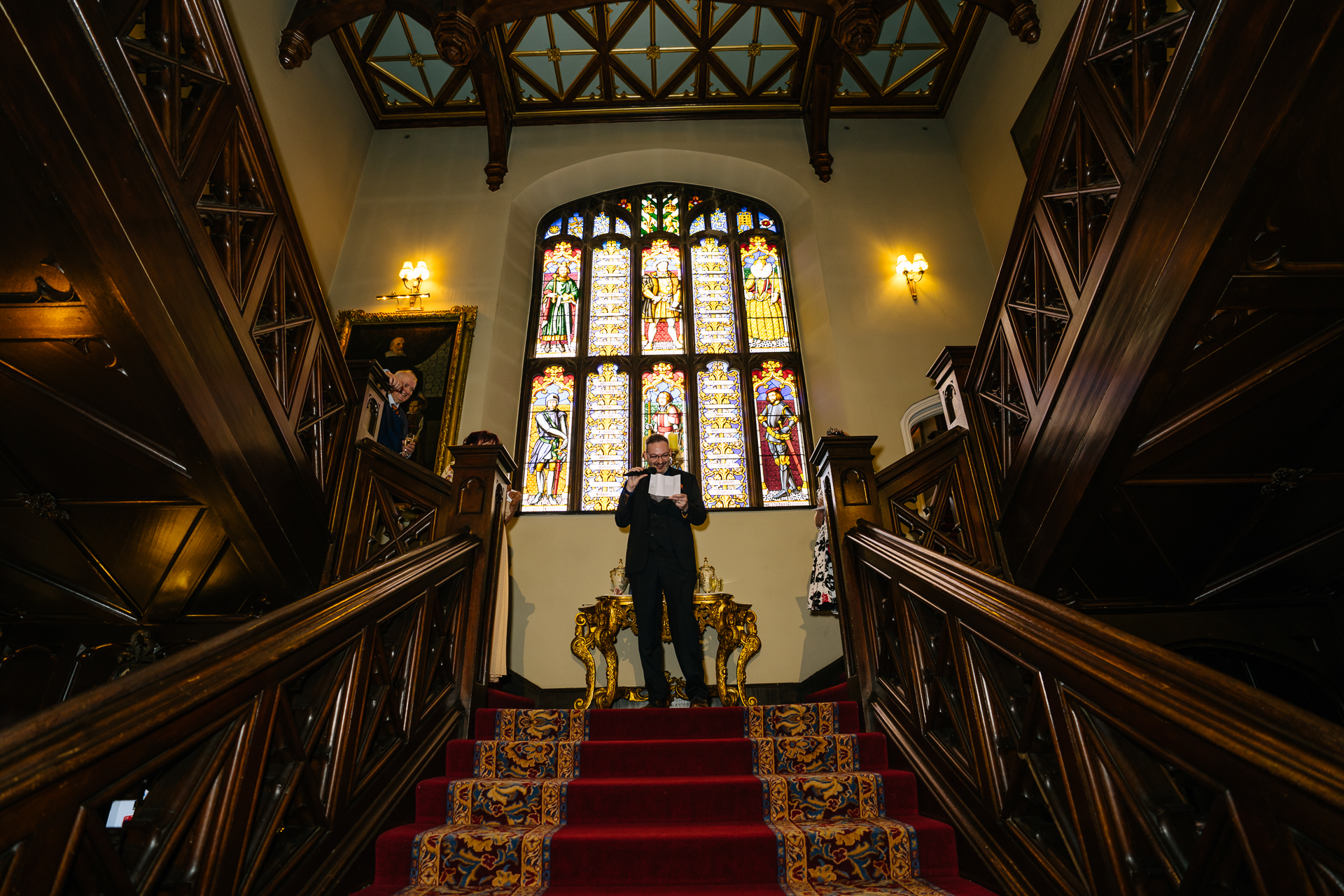 Wedding speeches during a same-sex wedding reception at Markree Castle, Ireland, featuring emotional and joyful moments shared by family and friends