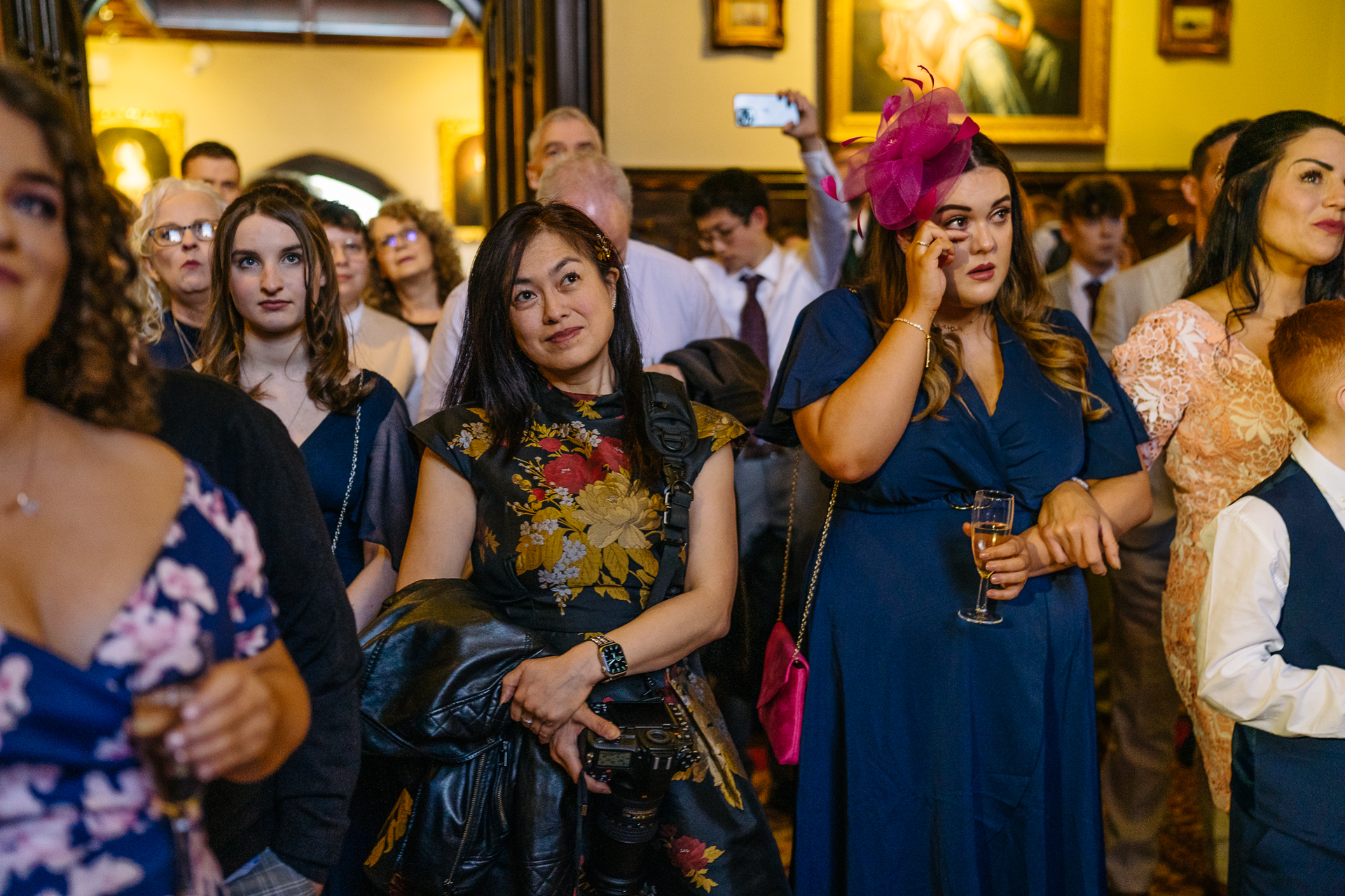 Wedding speeches during a same-sex wedding reception at Markree Castle, Ireland, featuring emotional and joyful moments shared by family and friends