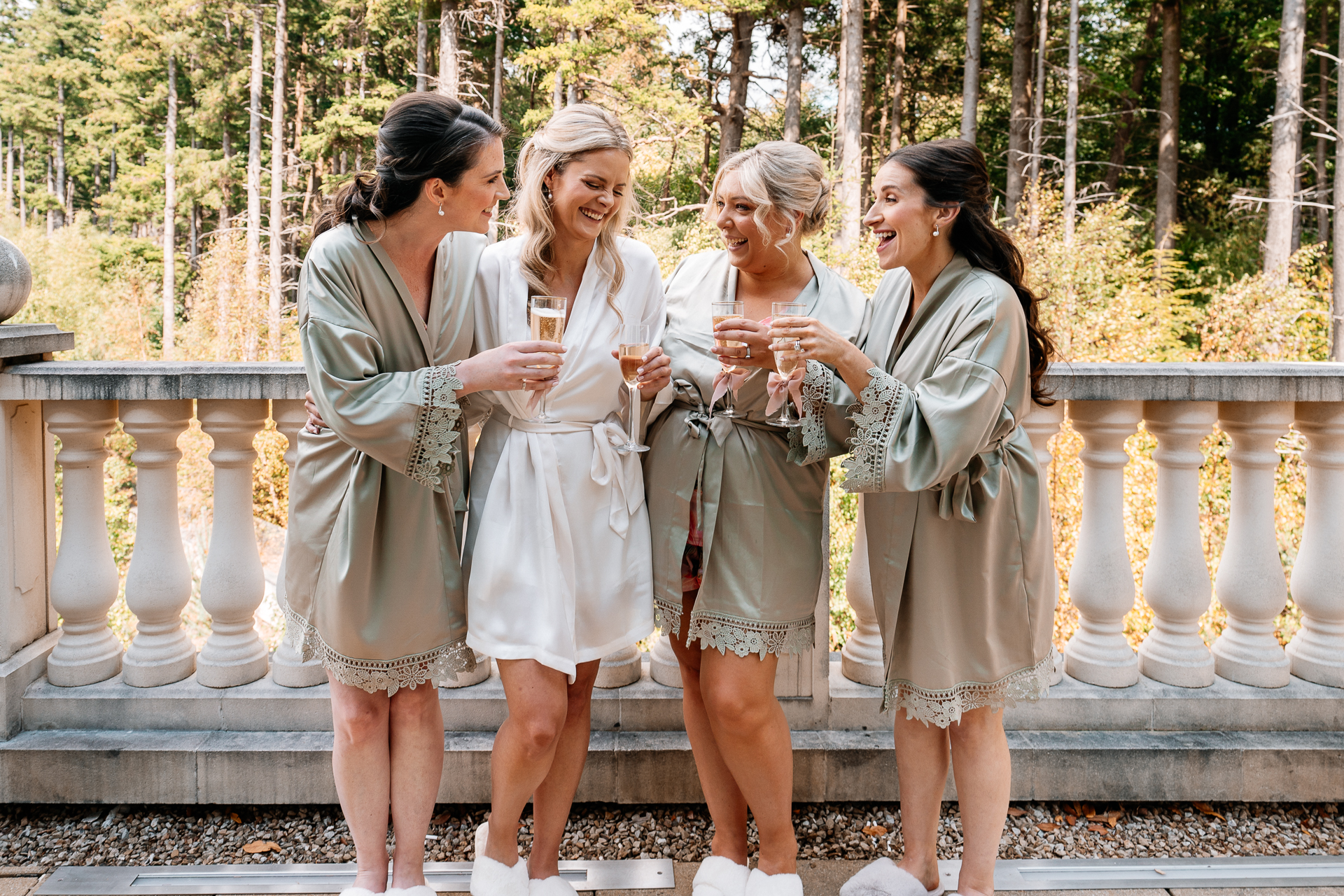 A group of women in white dresses