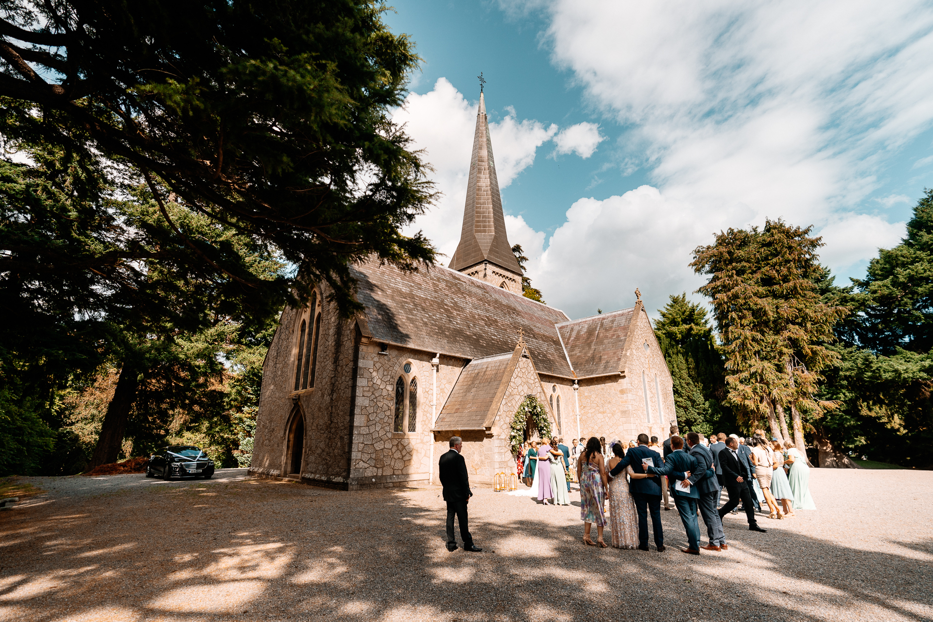 A group of people outside a church