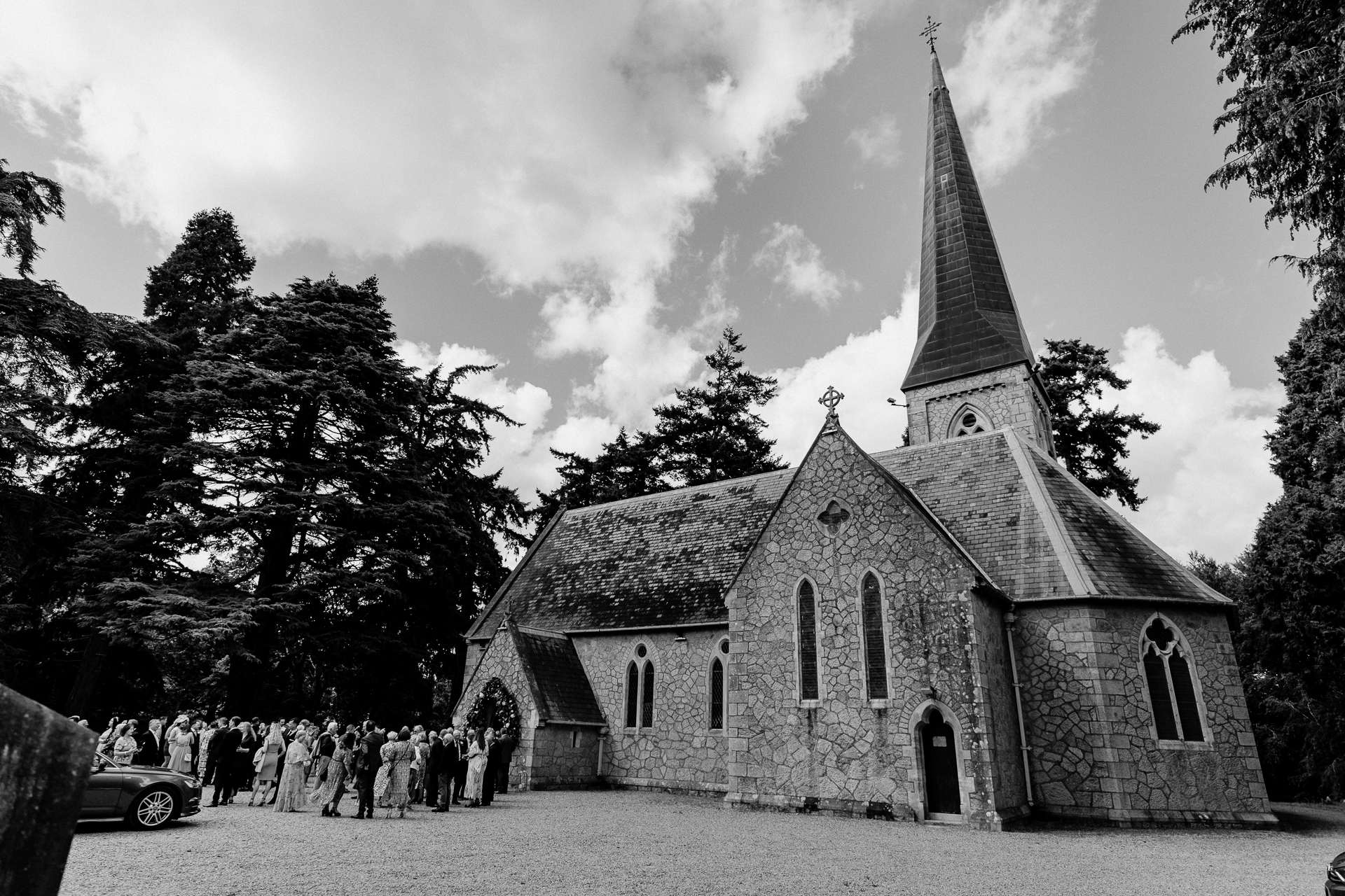 A group of people outside a church