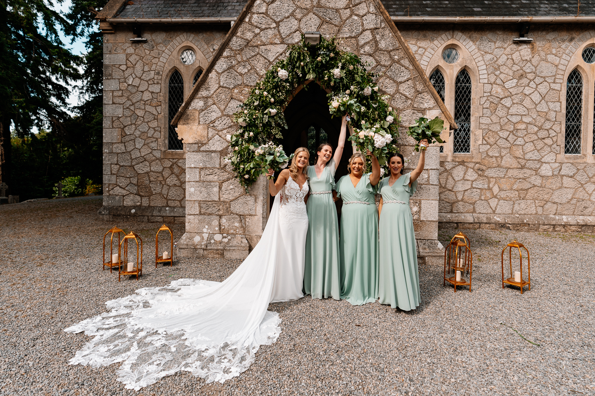 A group of women in dresses posing for a picture