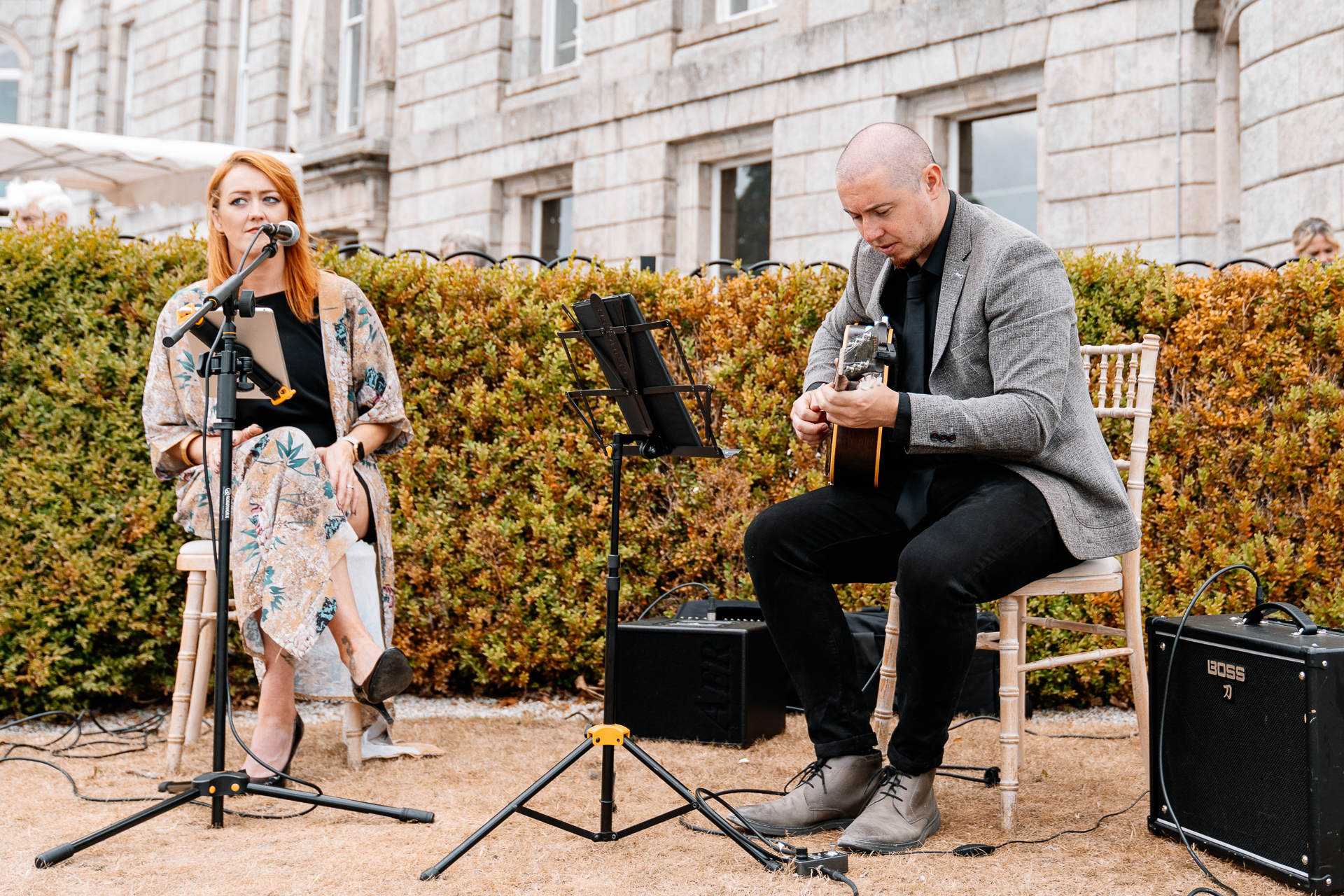 A man and woman playing instruments