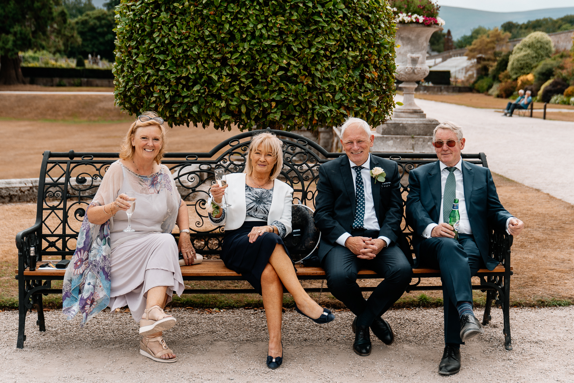 A group of people sitting on a bench