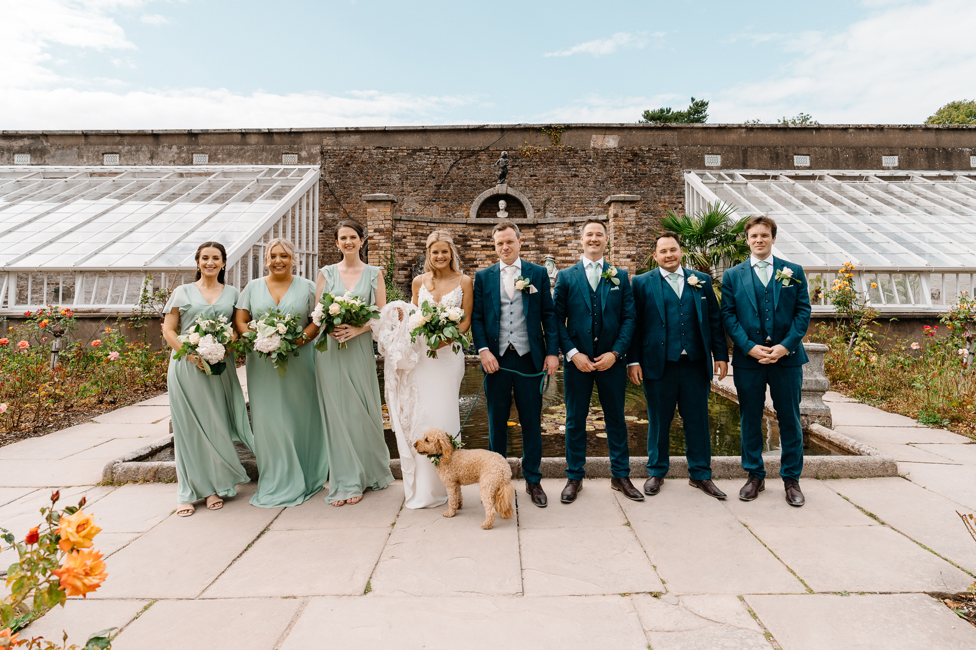 Bride celebrating with her bridesmaids at Powerscourt House in Wicklow.