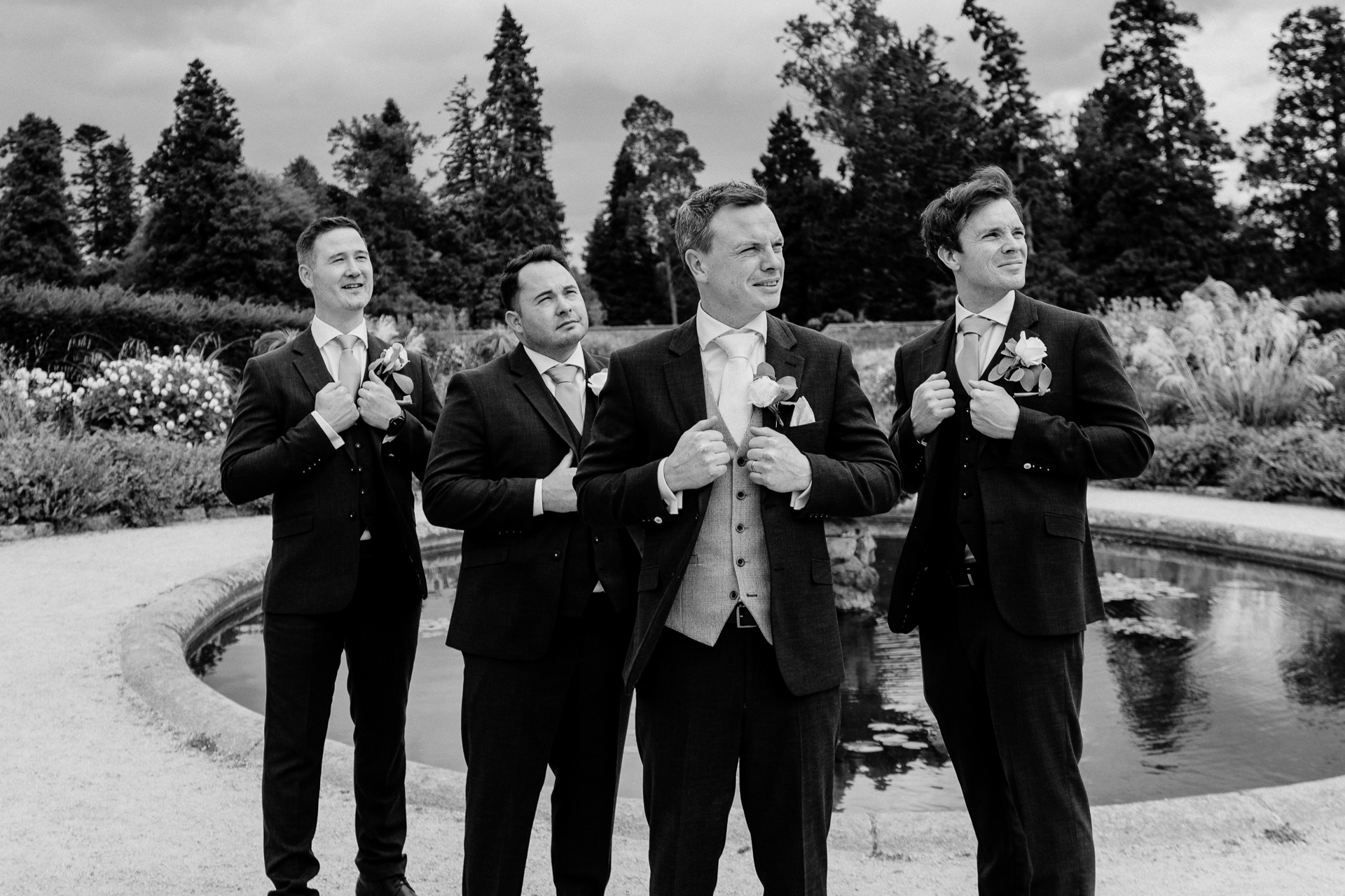 Bride celebrating with her bridesmaids at Powerscourt House in Wicklow.