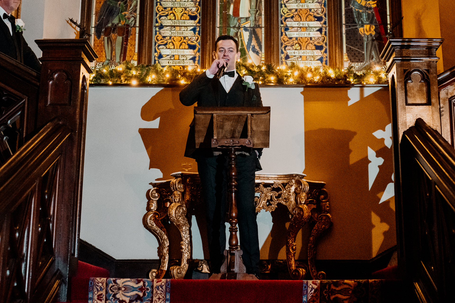 A person standing at a podium