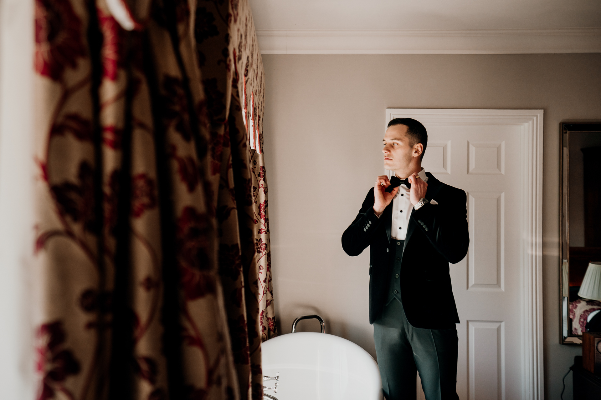 A man taking a picture of himself in a mirror