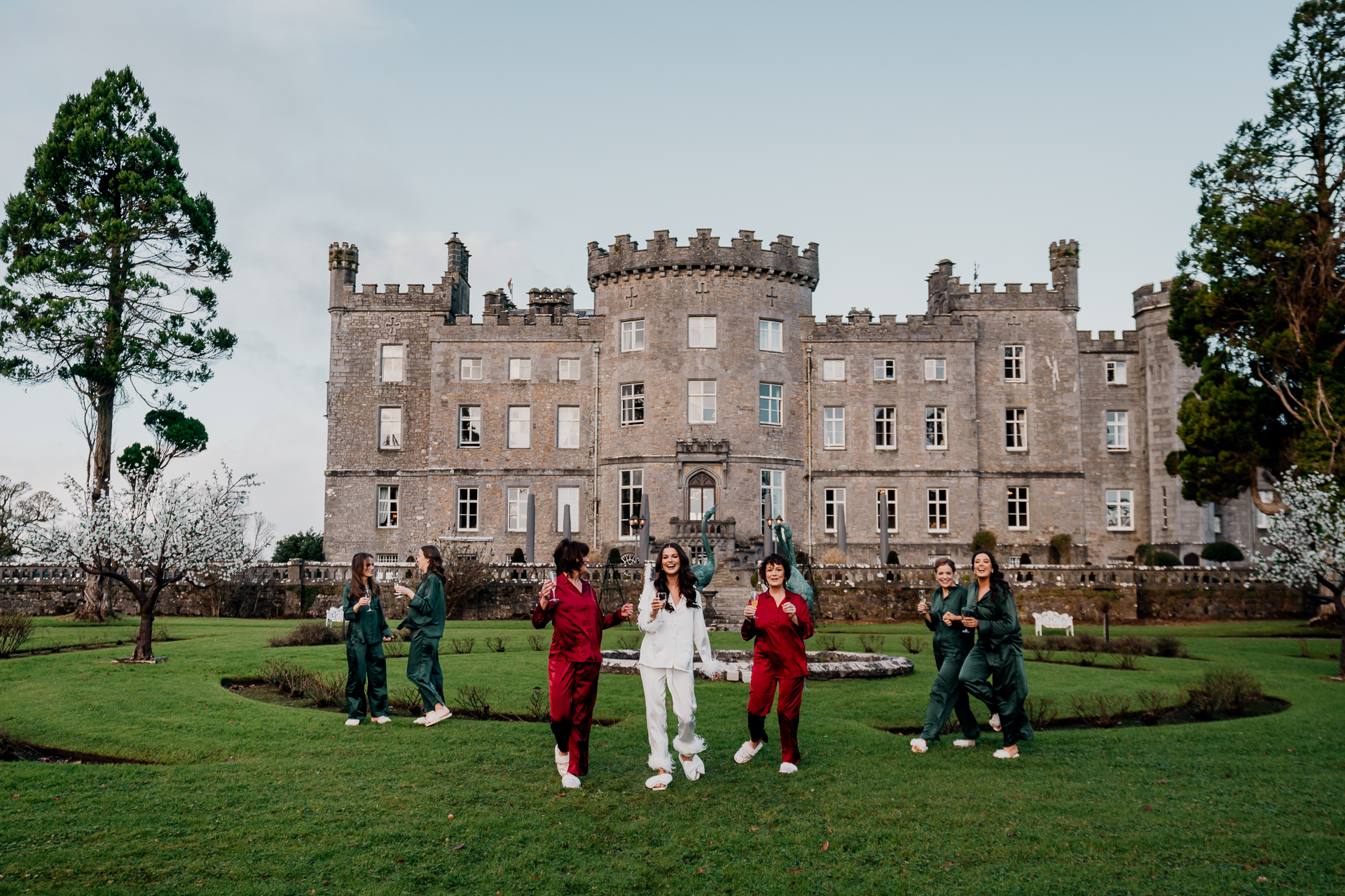 A group of people in front of a large building