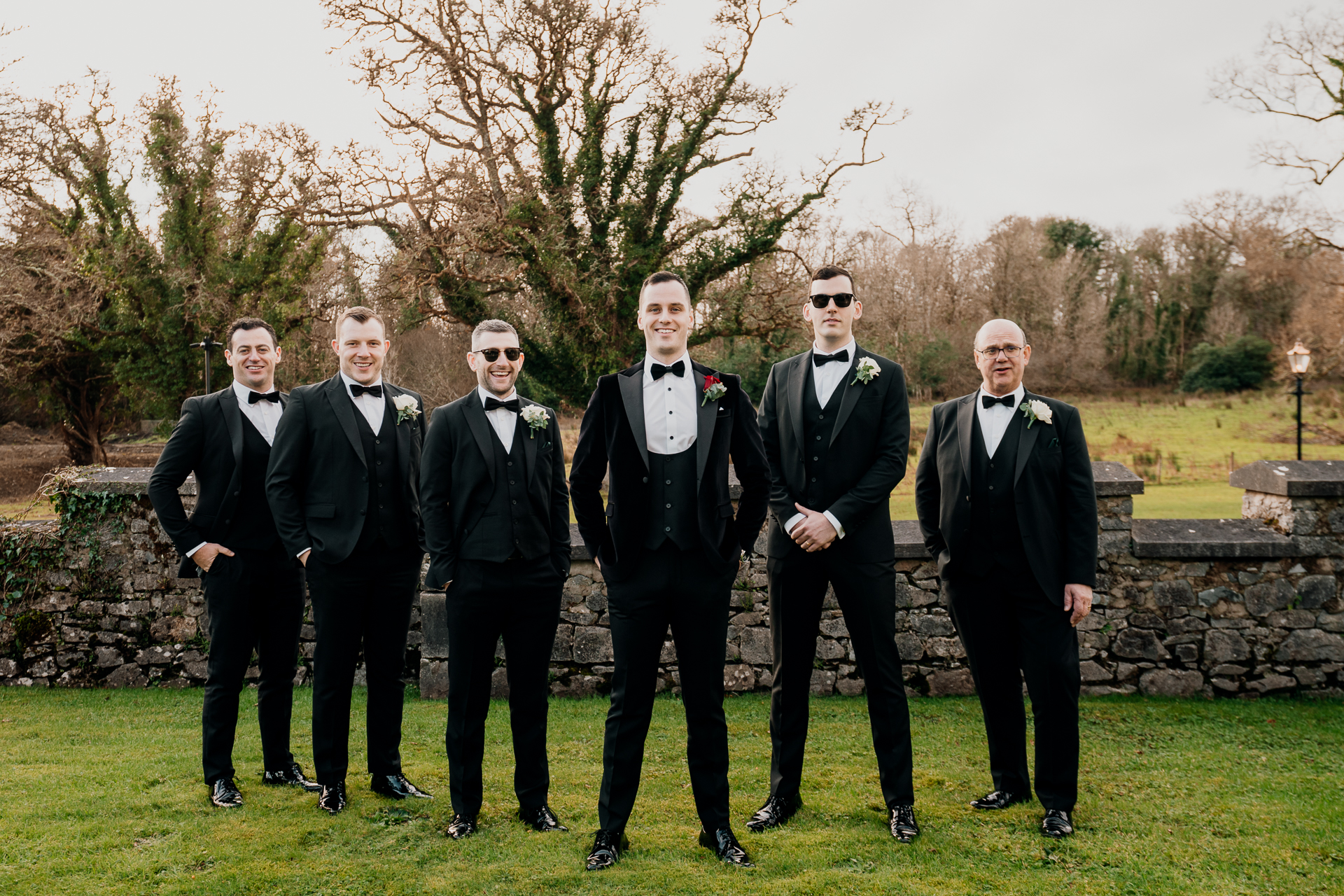A group of men in suits