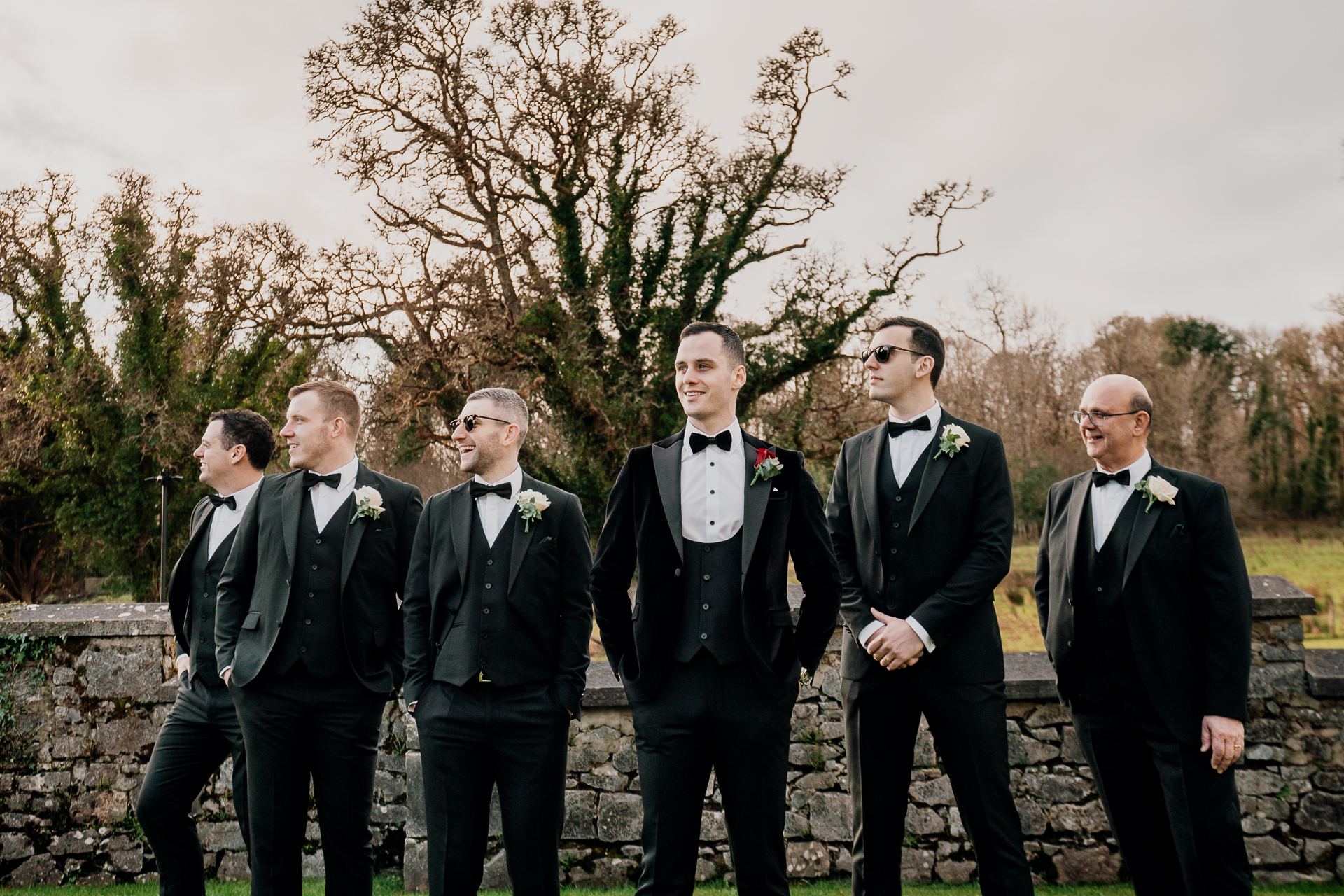 A group of men in suits