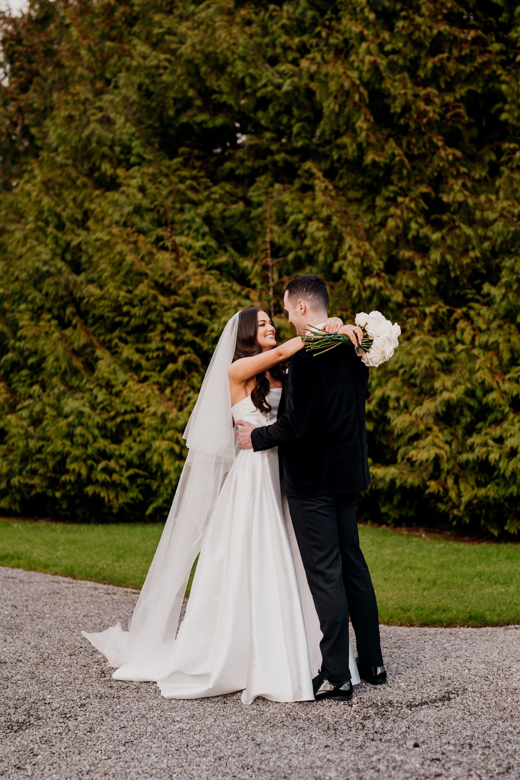 A man and woman in wedding attire