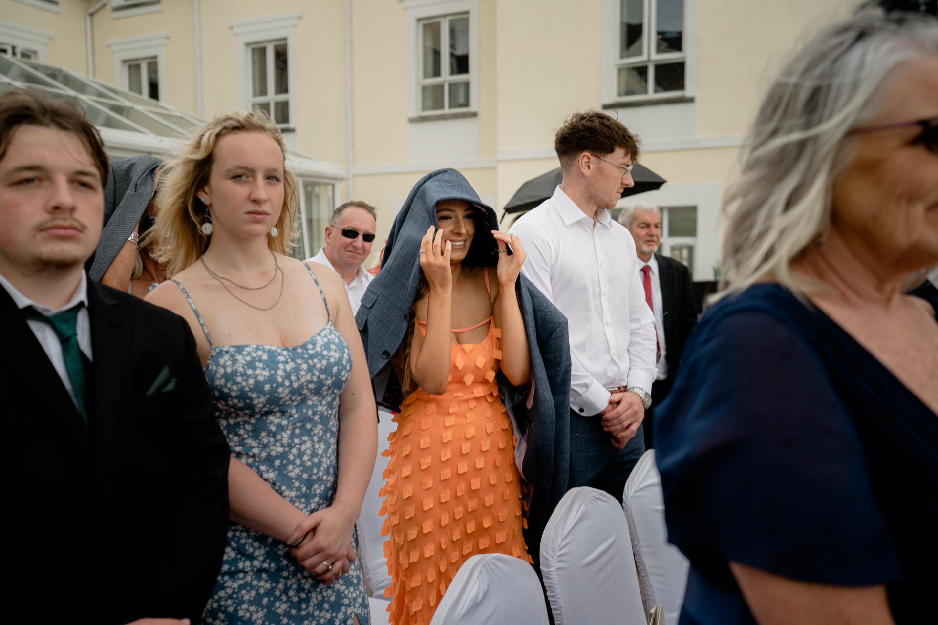 A group of people standing outside