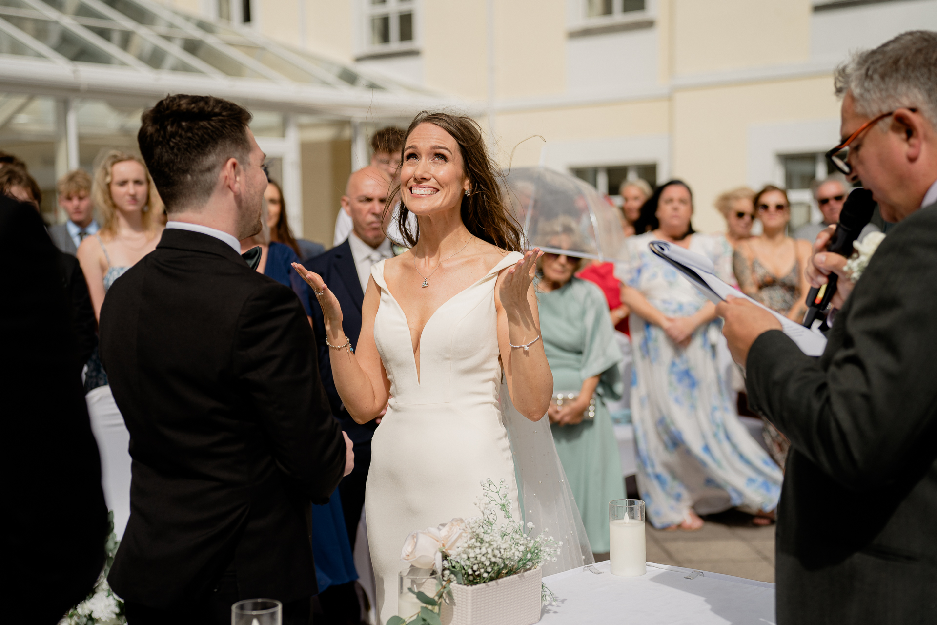 A woman in a wedding dress and a man in a suit