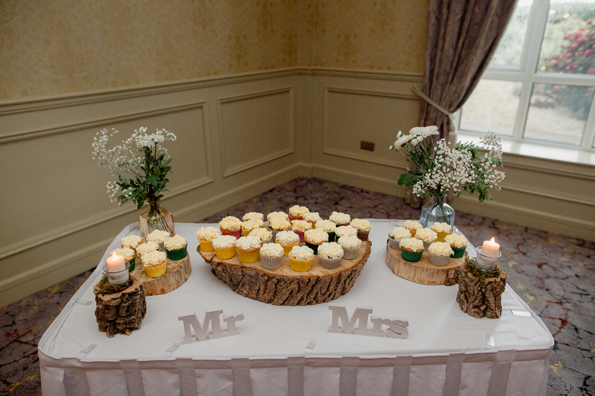 A table with cupcakes on it