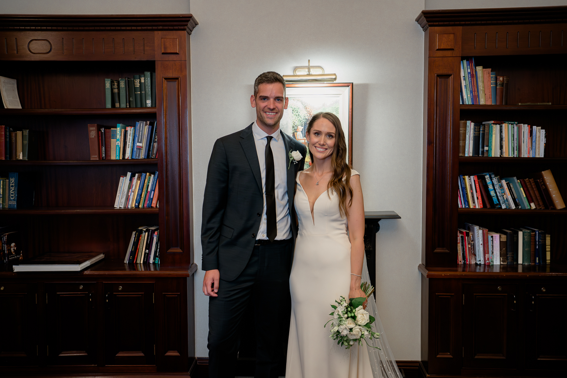 A man and woman posing for a picture