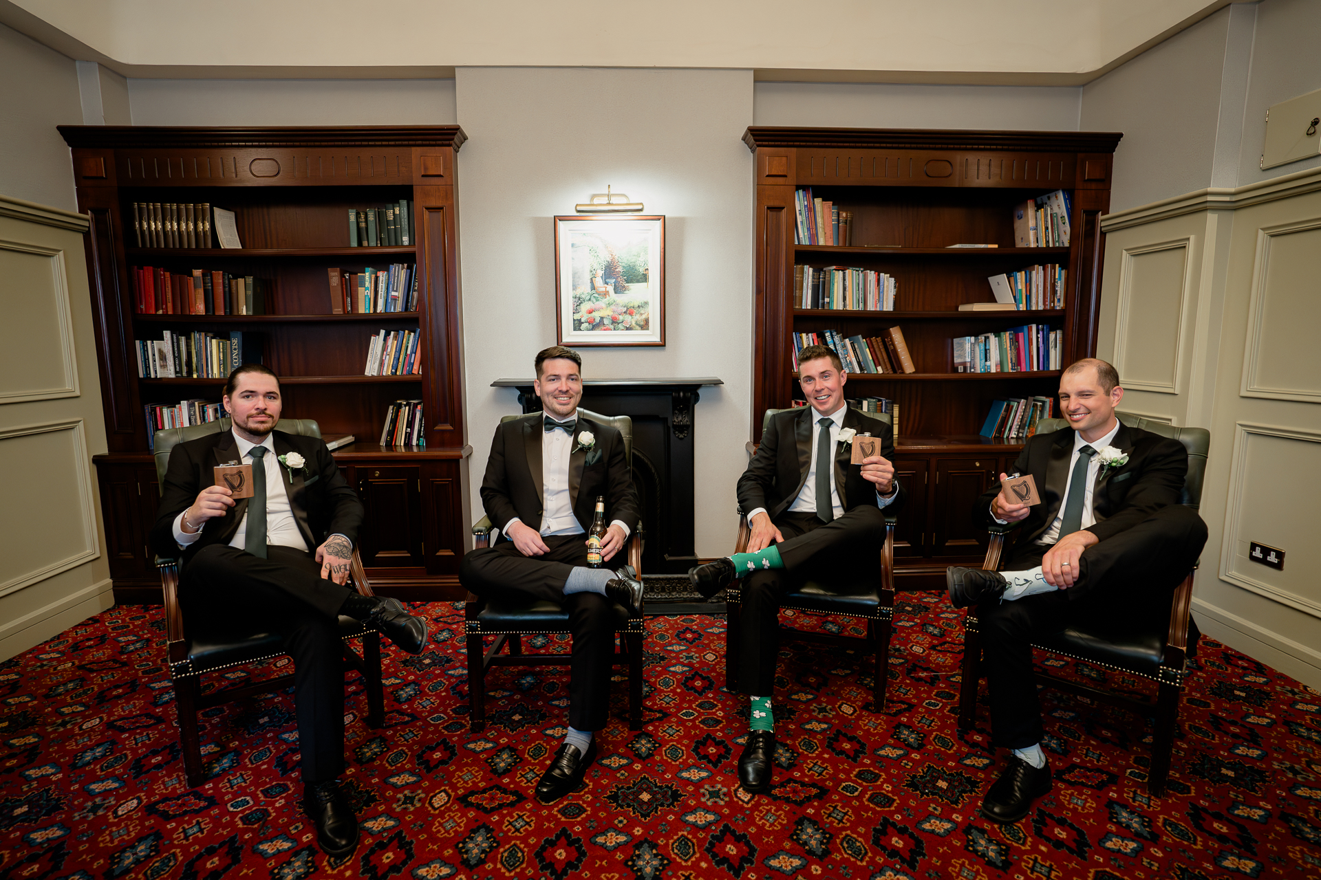 A group of men sitting in chairs