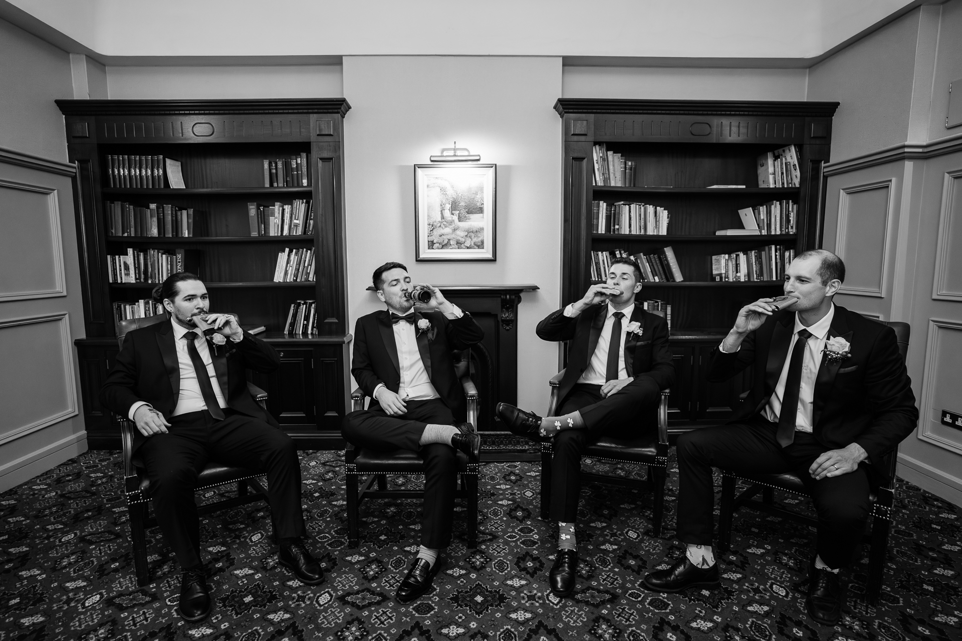 A group of men sitting in chairs