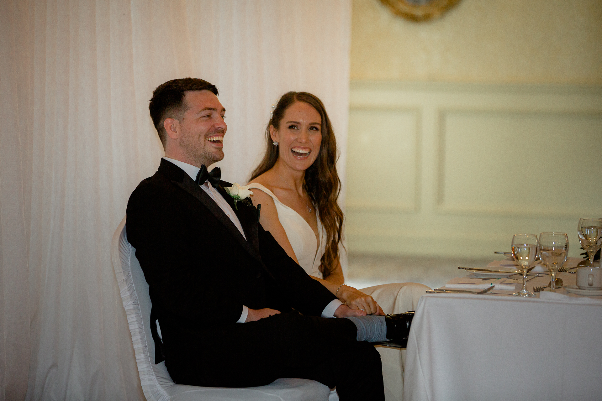 A man and woman sitting at a table