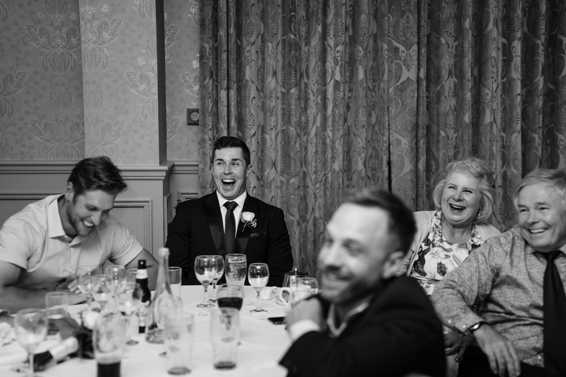 A group of people sitting around a table