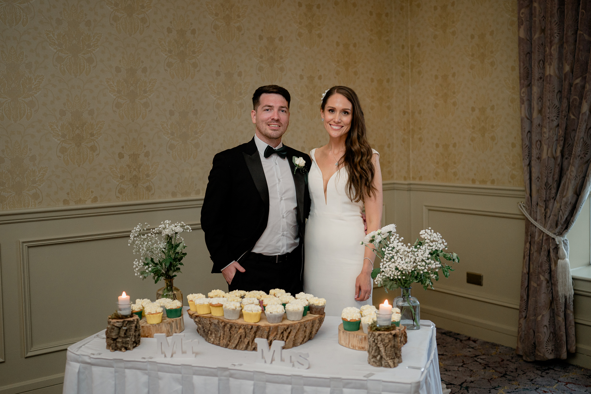 A man and woman posing for a picture