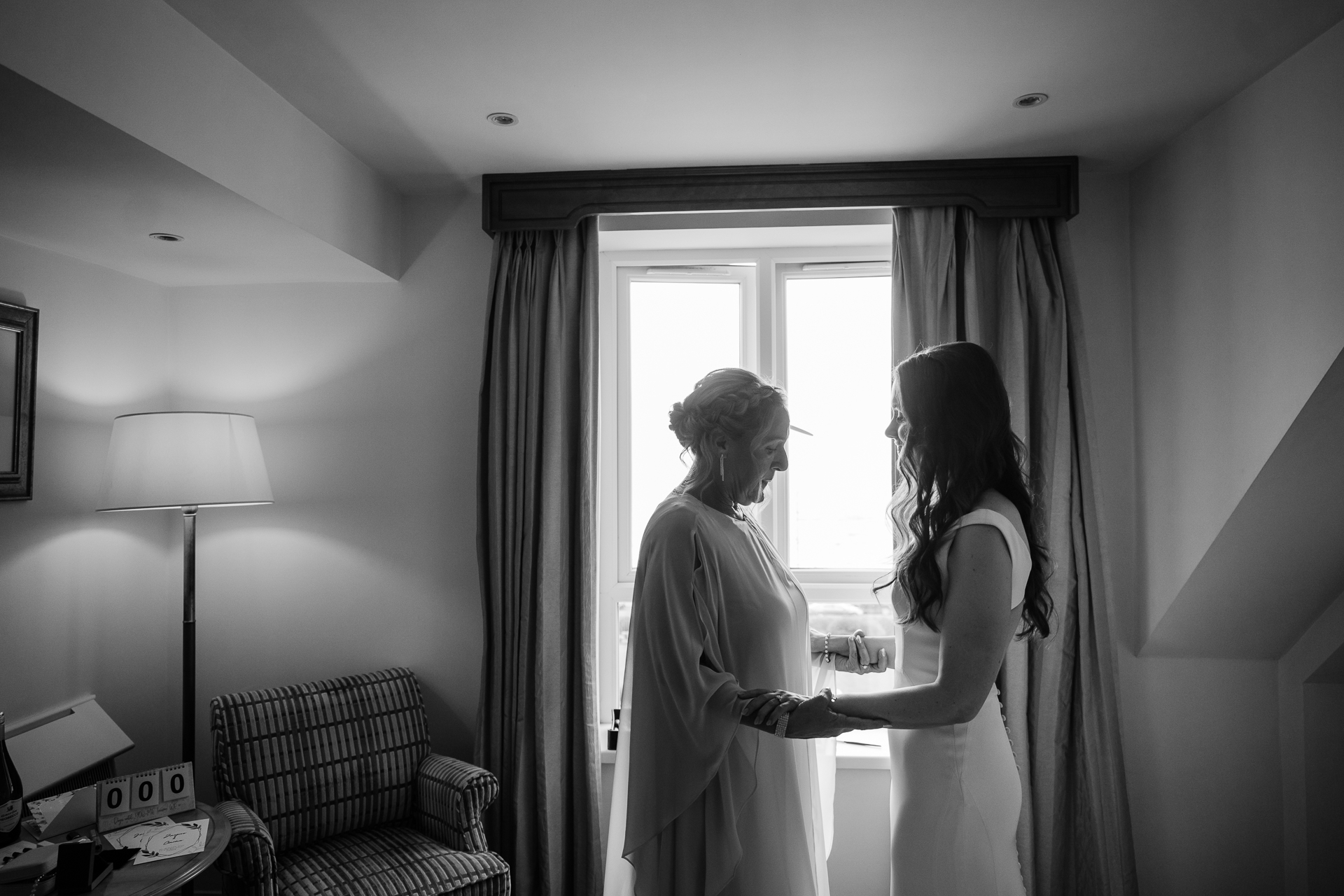 A bride and a groom in a room