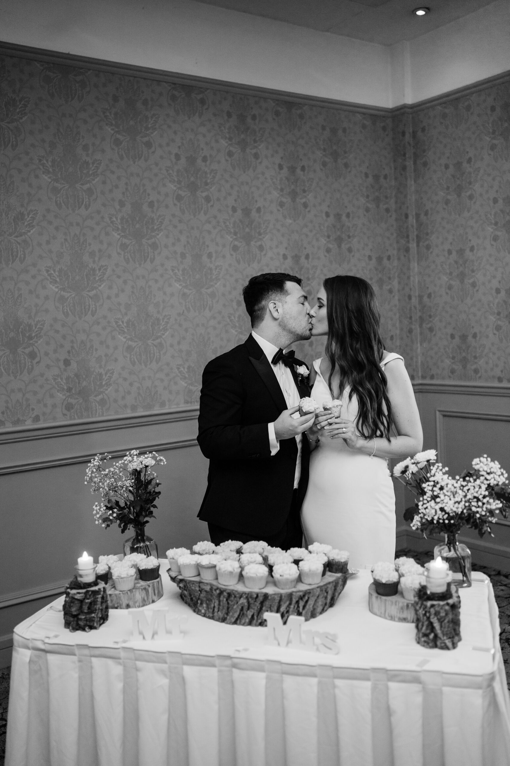 A bride and groom kissing