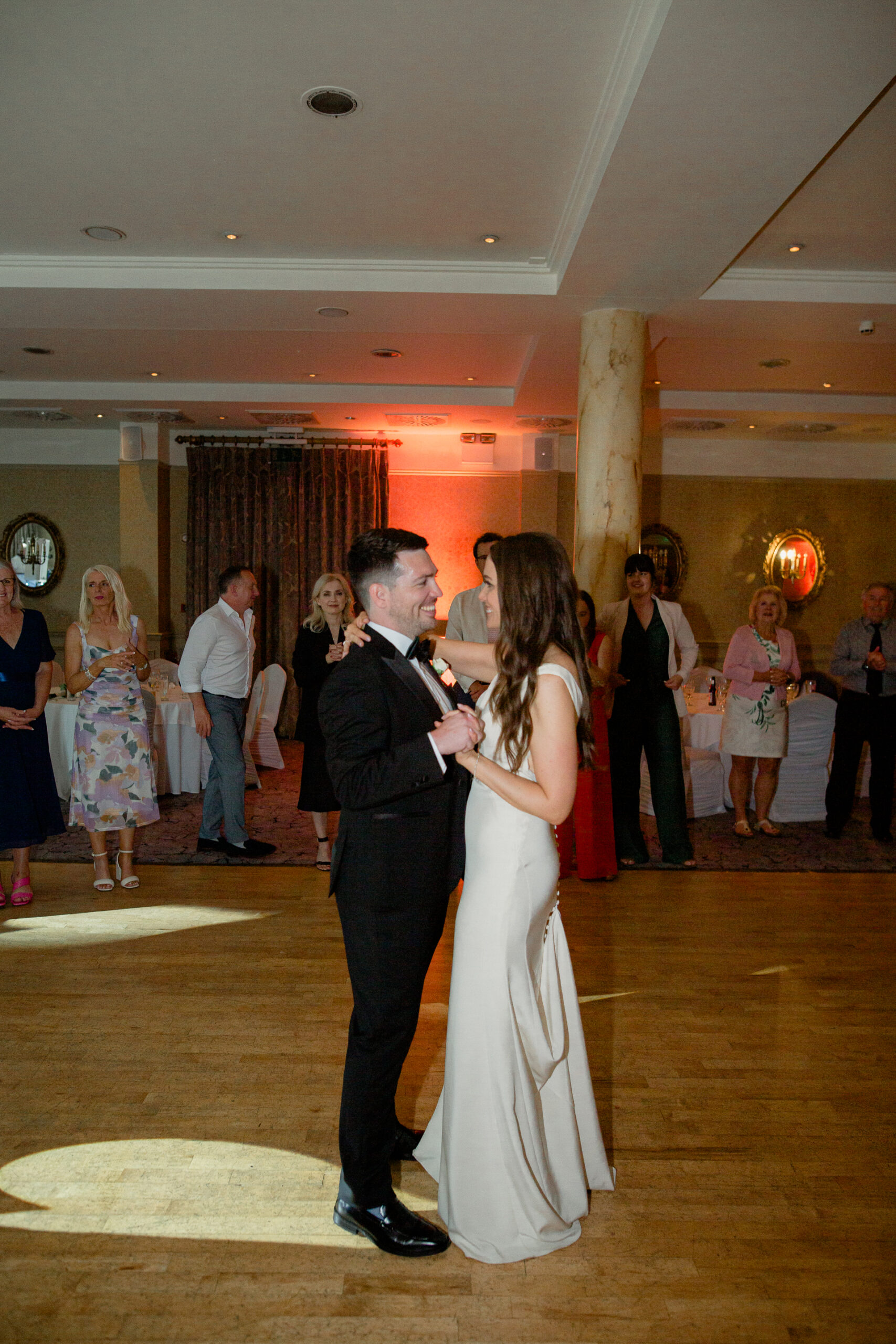 The dance floor came alive as the couple shared their first dance at Galway Bay Hotel, followed by an unforgettable night of celebration. Laughter, music, and energy filled the venue as guests danced the night away.