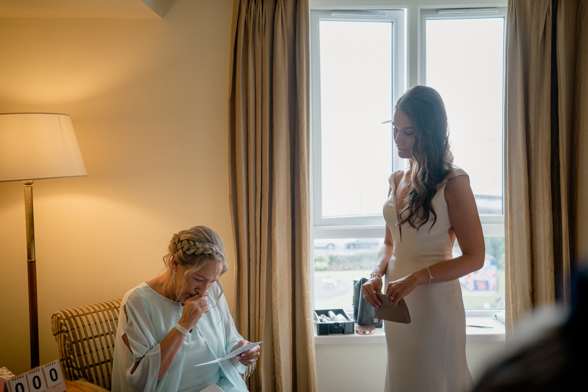 A woman in a white dress and a woman in a white dress