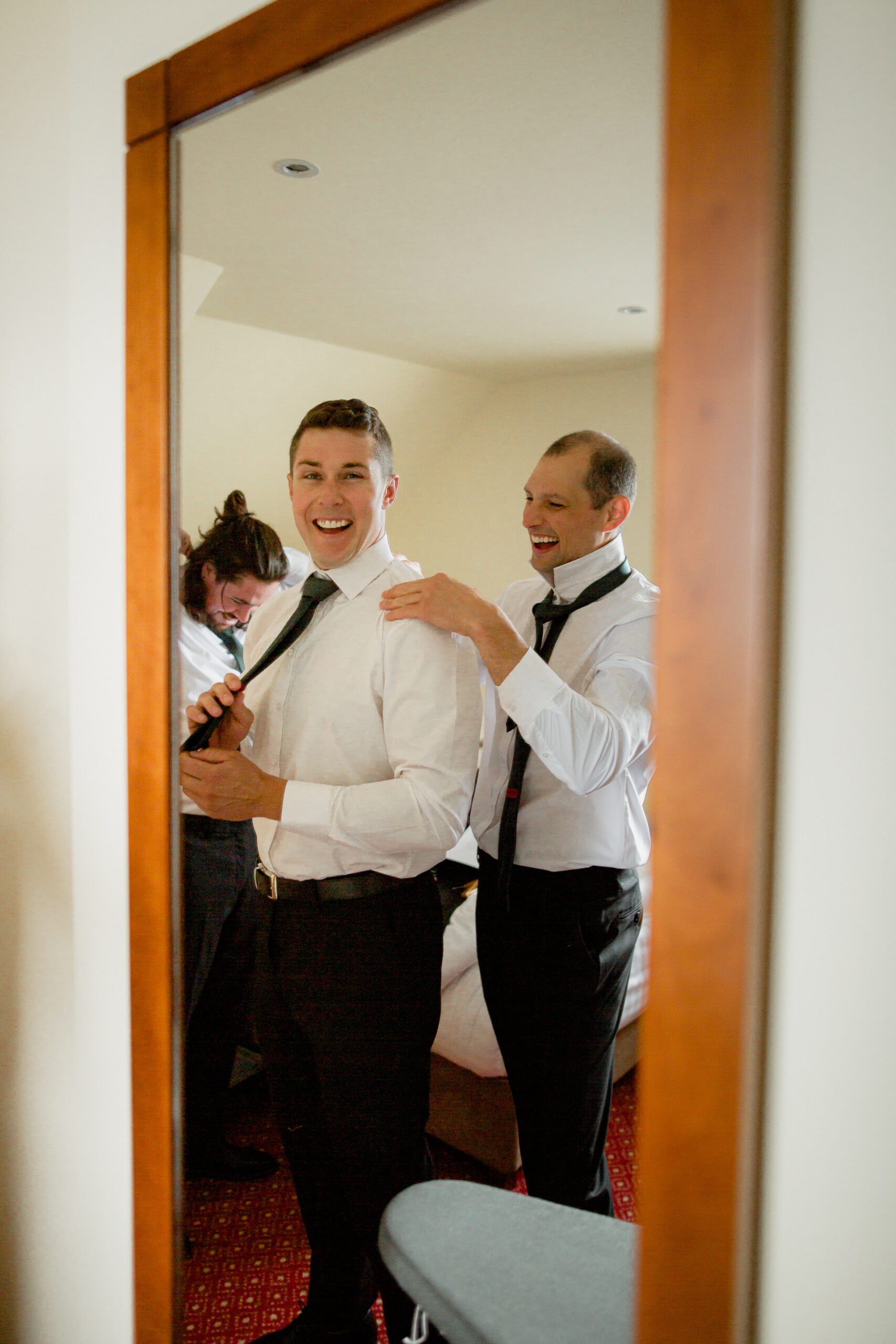 The excitement builds as the bride and groom prepare for their Galway Bay Hotel Wedding. From delicate bridal details to the groom’s final touches, every moment is filled with anticipation. This documentary-style photography captures the raw emotions and joy of getting ready for the big day.