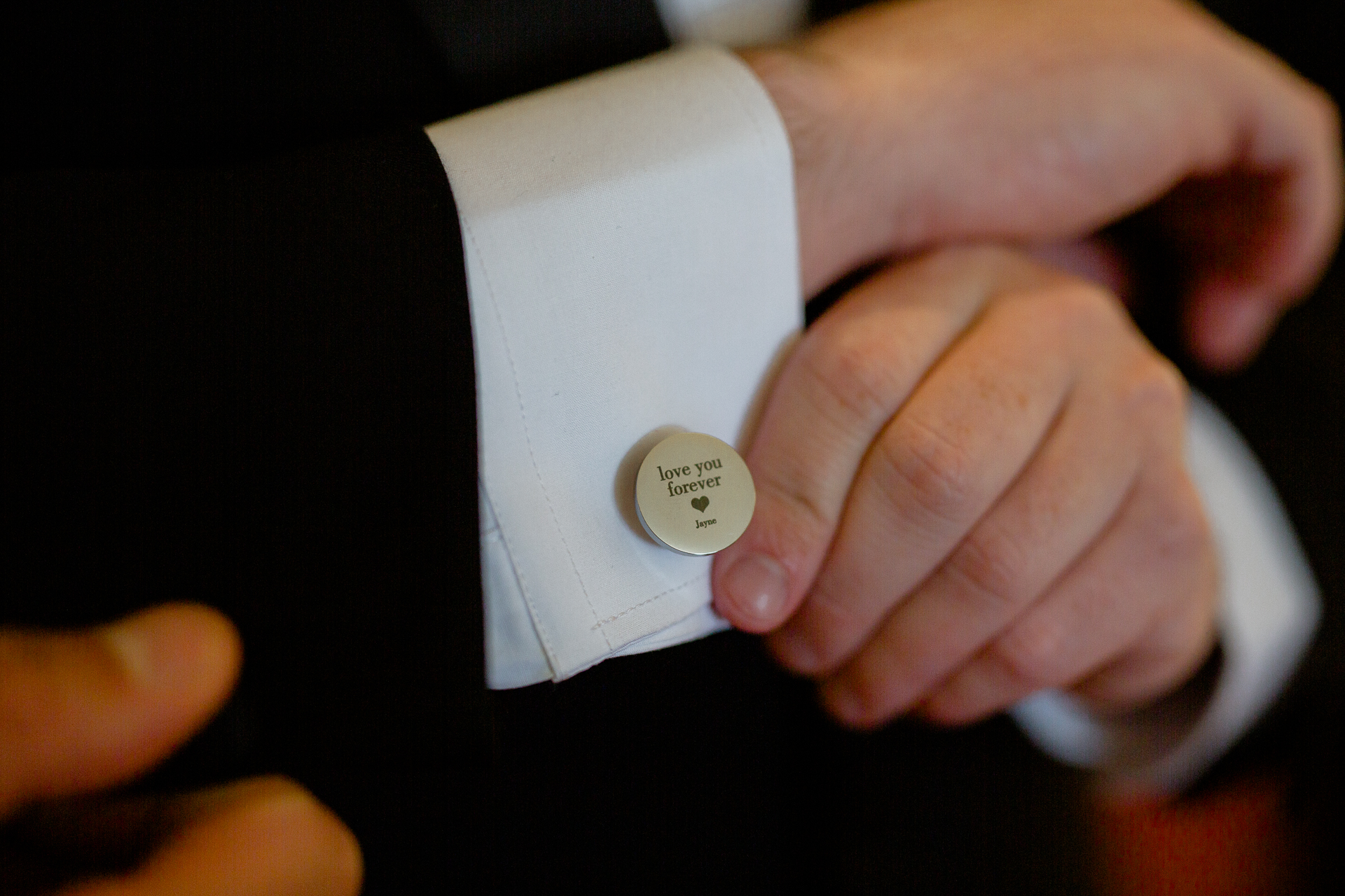 A person holding a small white card