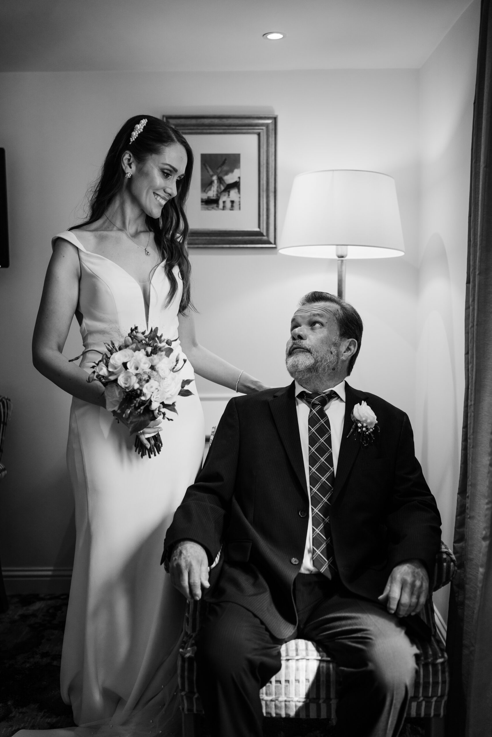 A bride and groom posing for a picture