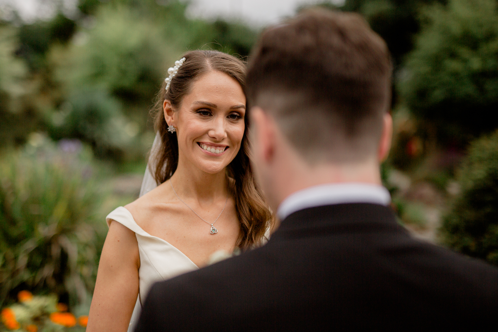 A man and woman smiling