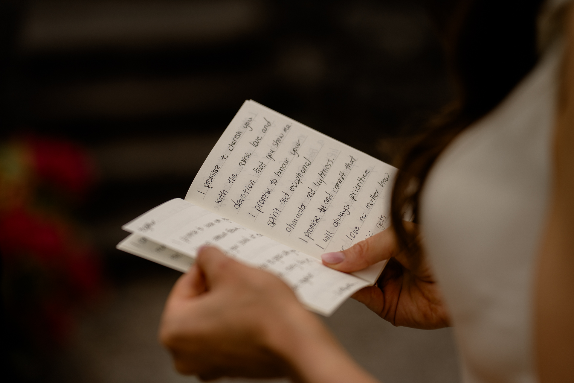 A person holding a piece of paper