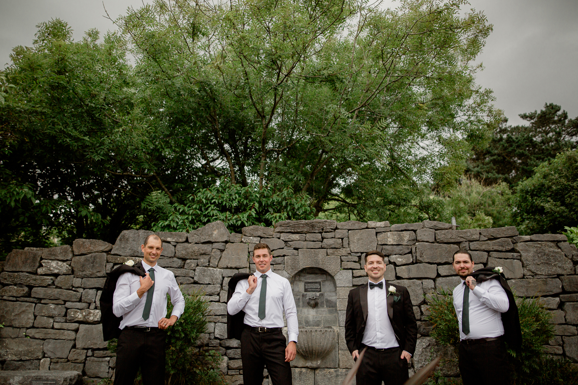 A group of men posing for a picture