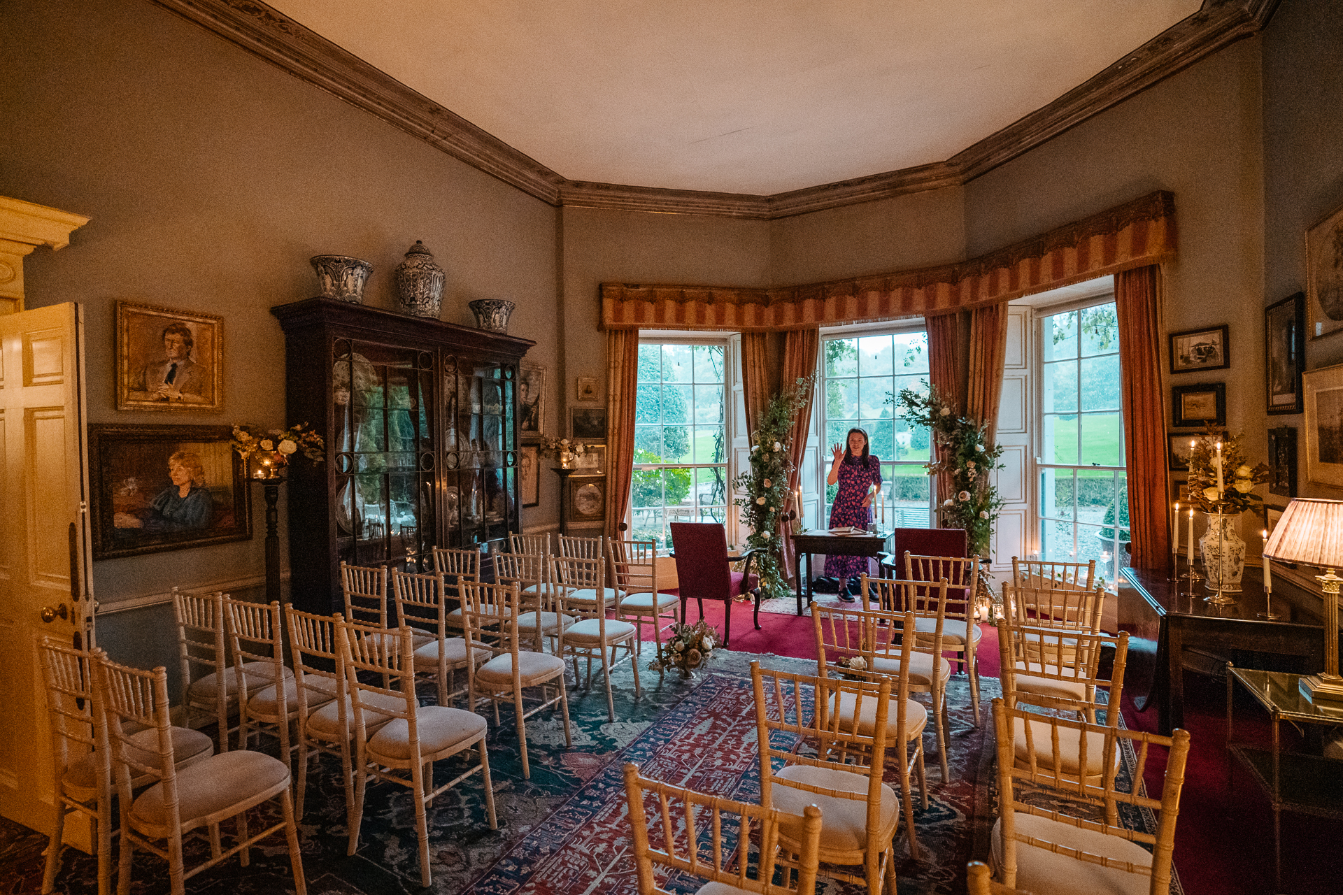 A dining room with a chandelier and a table