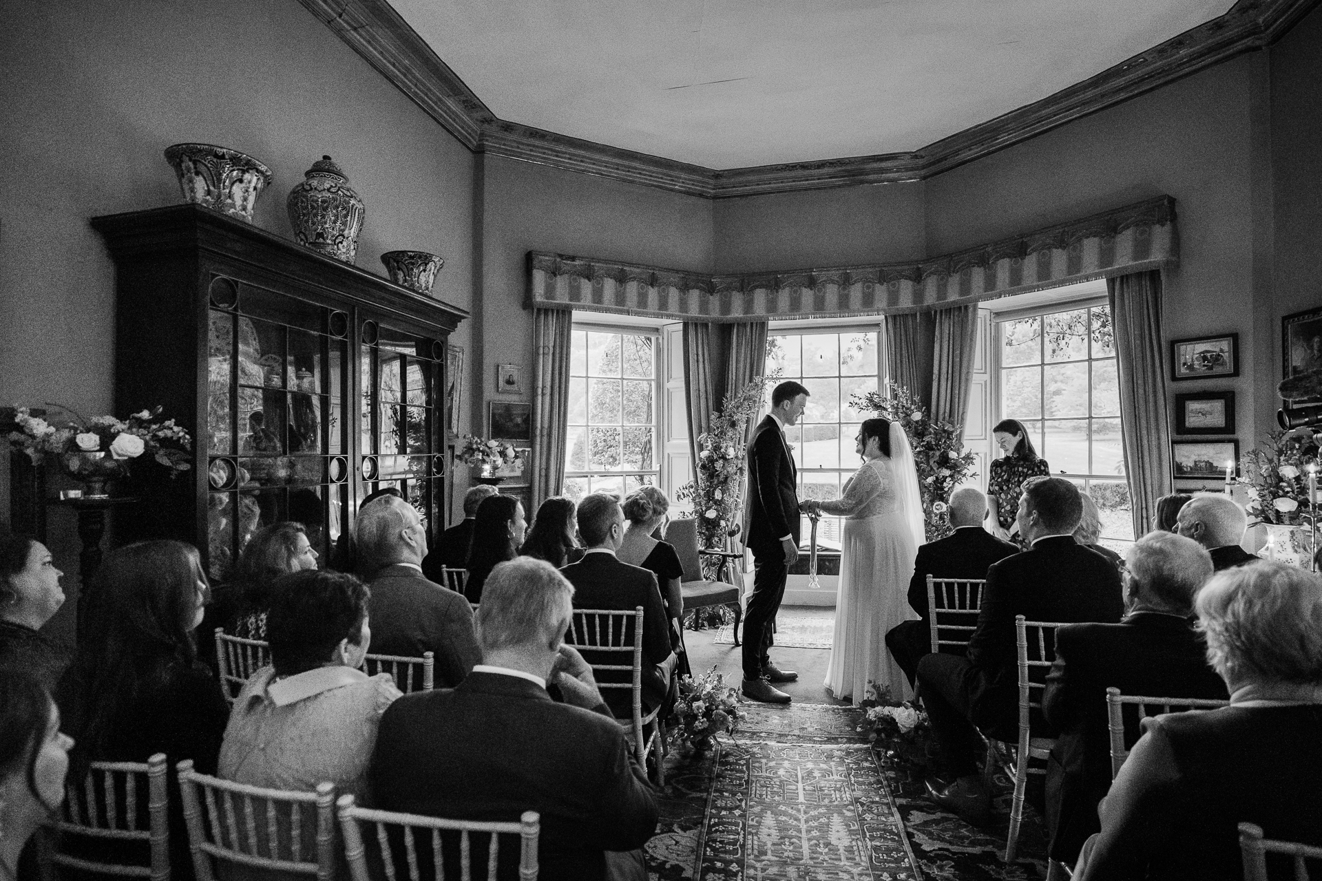 A bride and groom walking down the aisle