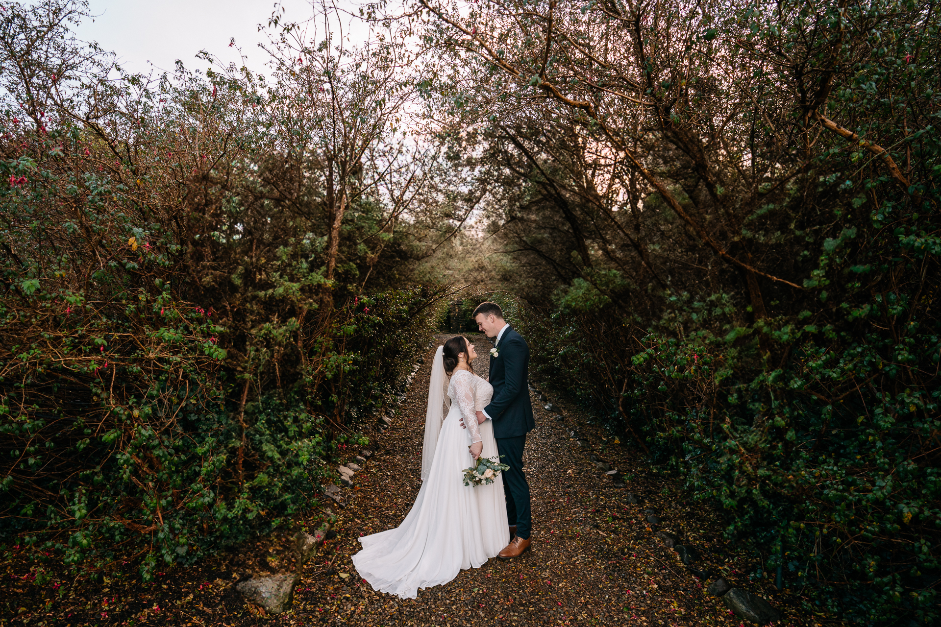 A man and woman in wedding attire