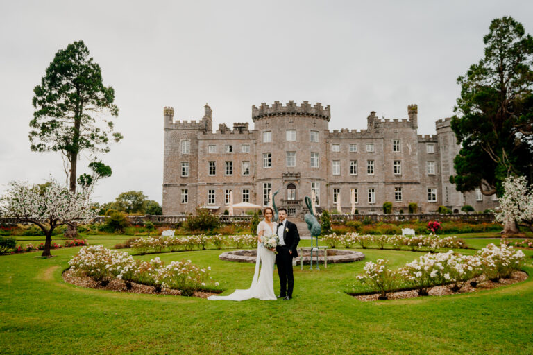 Bride and groom at sunset in front of Markree Castle, capturing their dream wedding in Ireland.