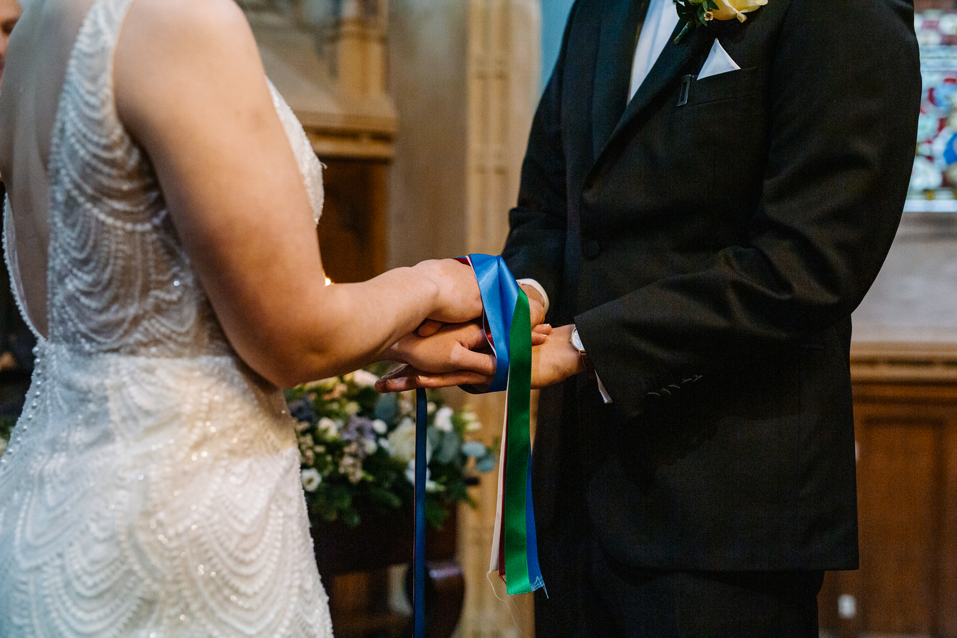 A man and woman holding hands