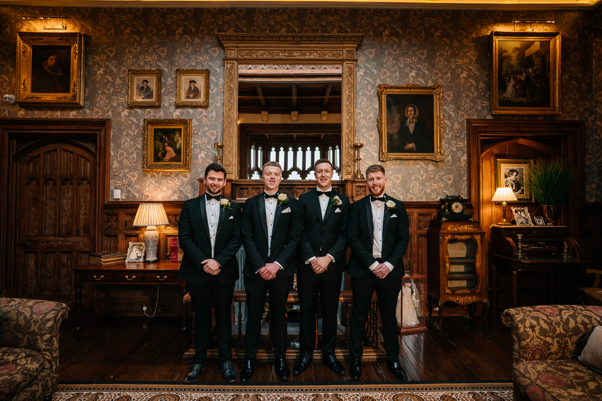 A group of men posing for a photo