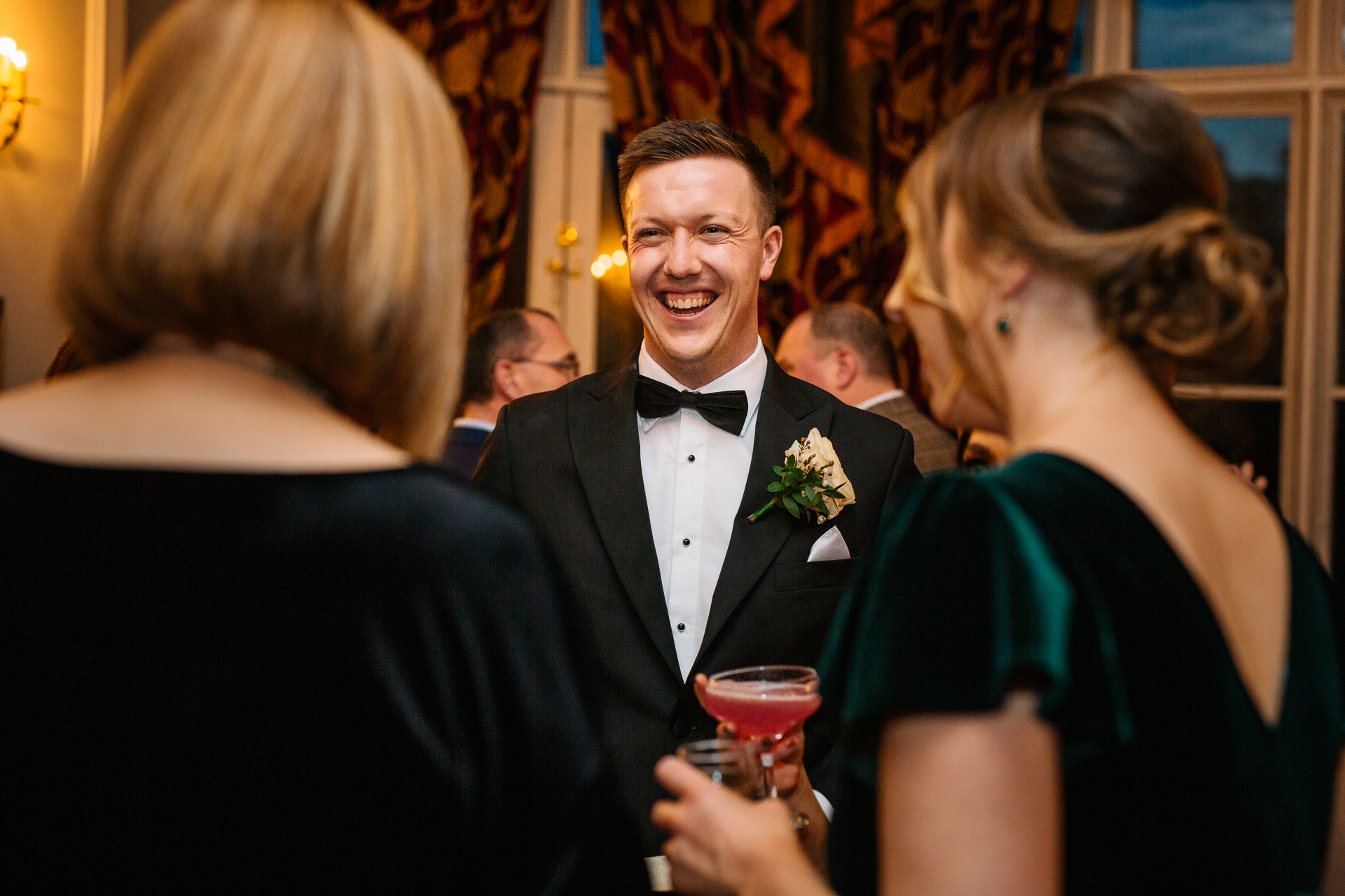 A man in a tuxedo and a woman in a dress