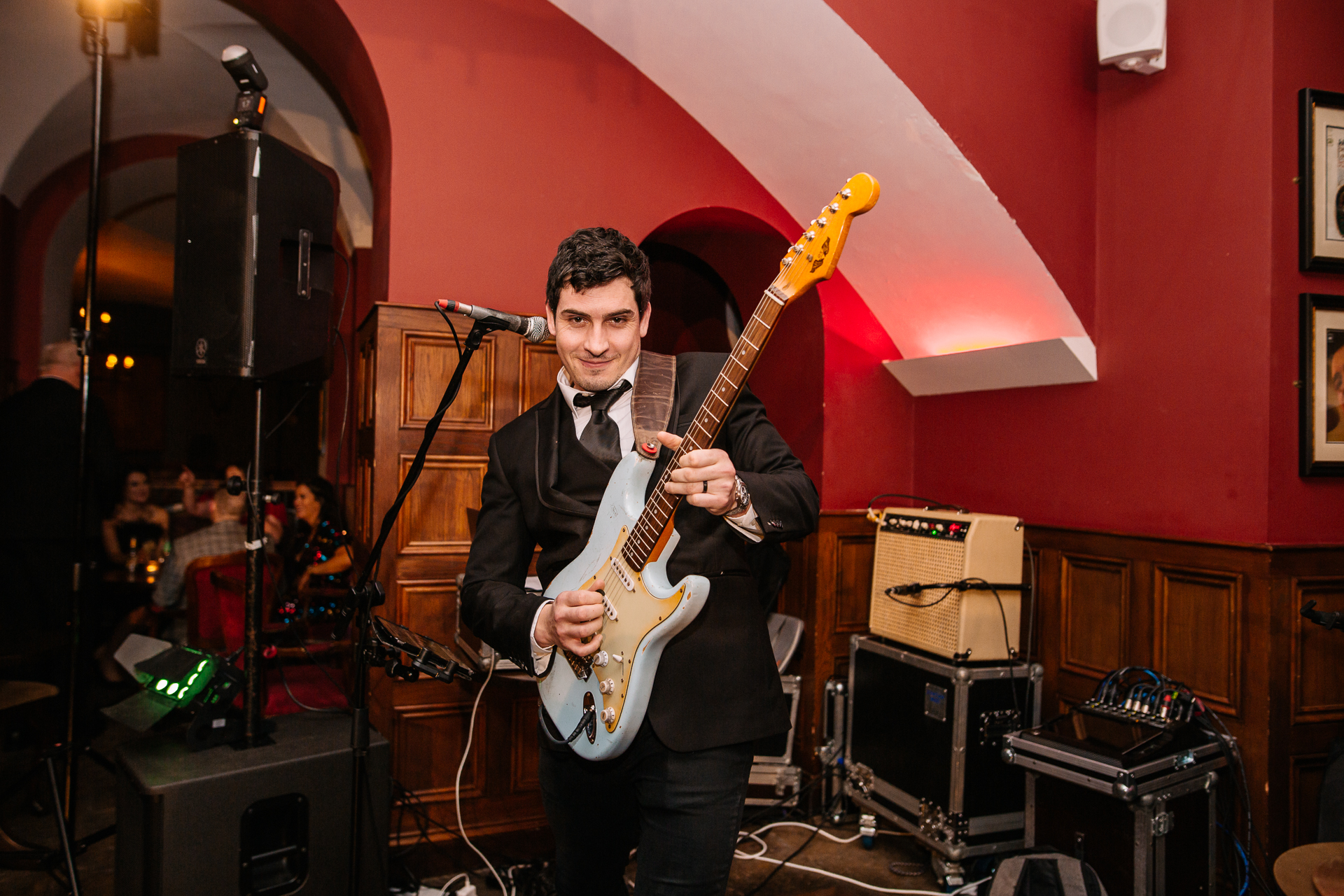 A man playing a guitar