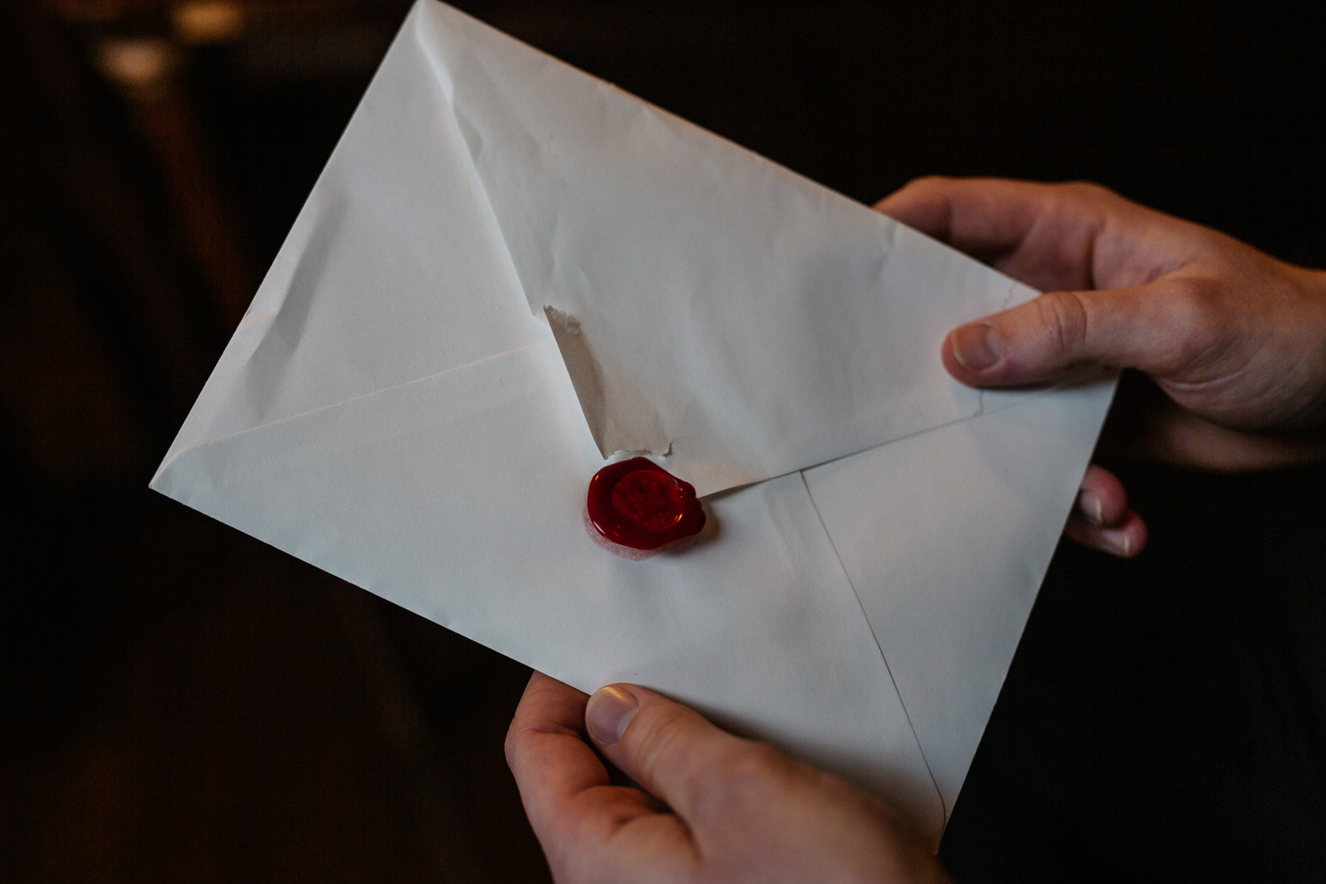 A person holding a piece of paper