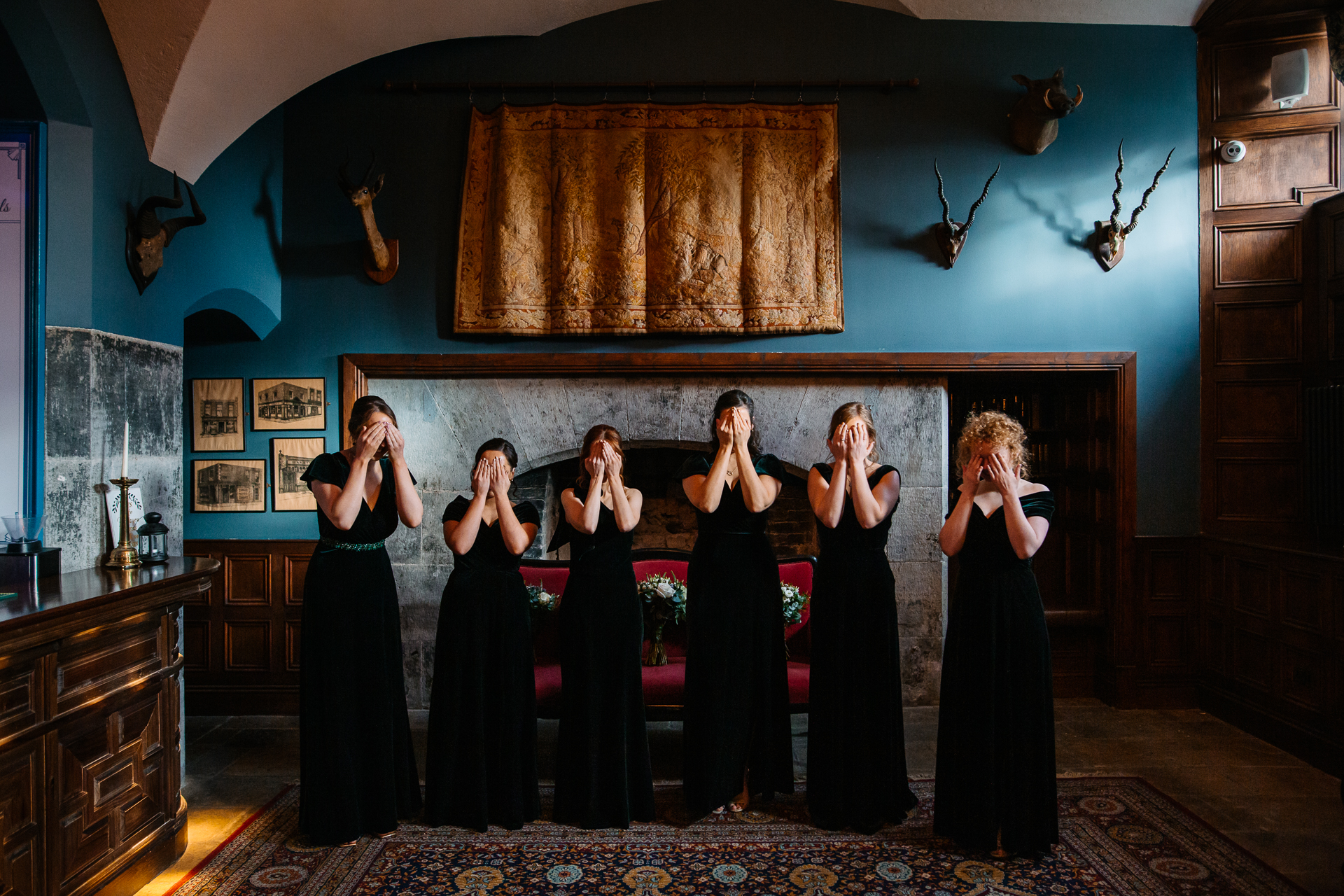 A group of women in black dresses