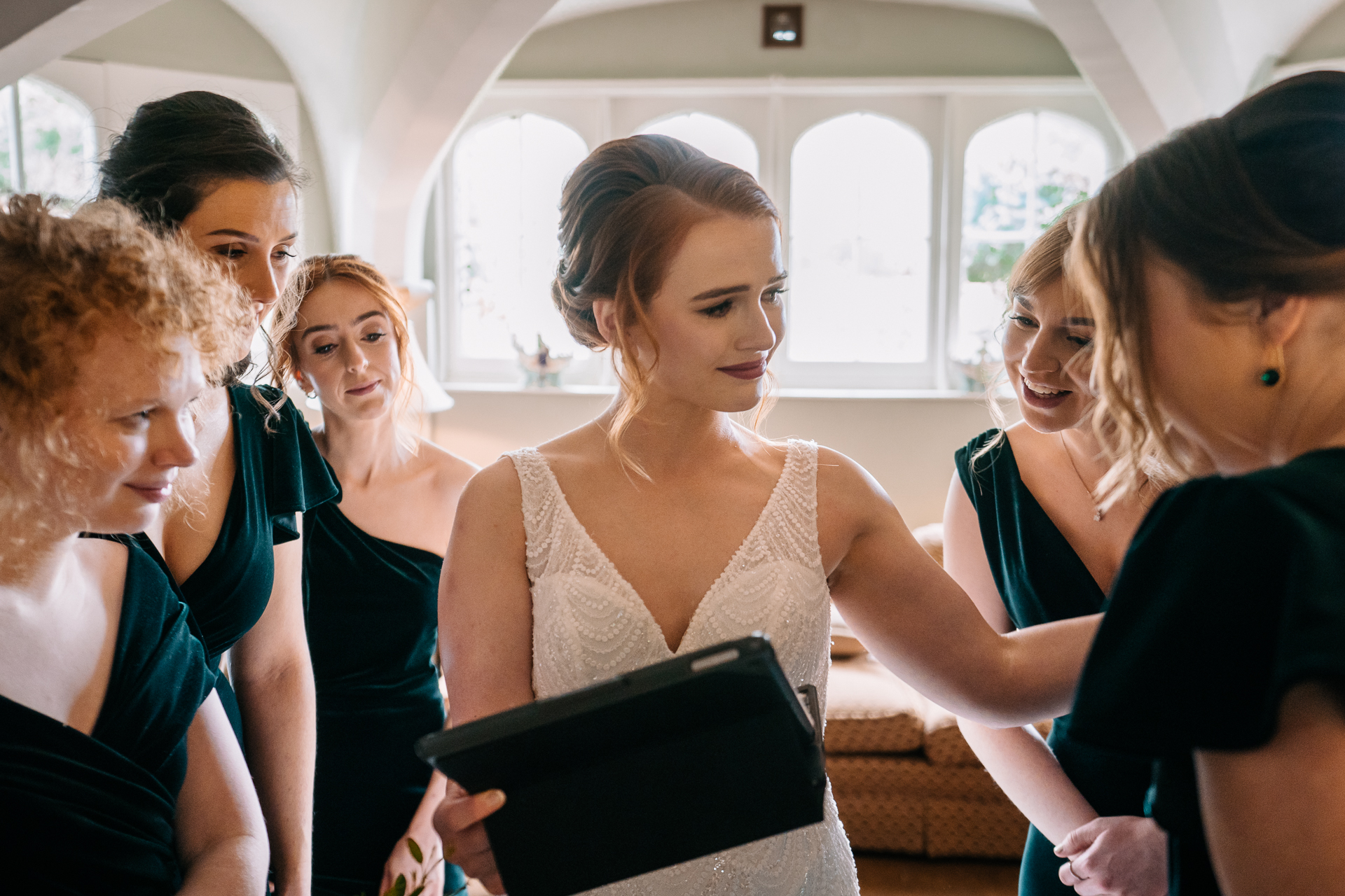 A group of women looking at a laptop