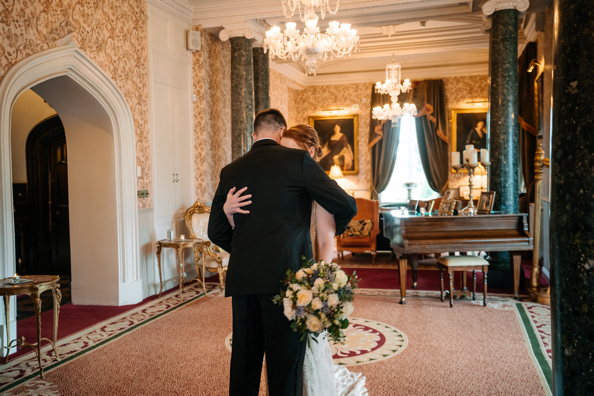 A man and woman kissing in a church