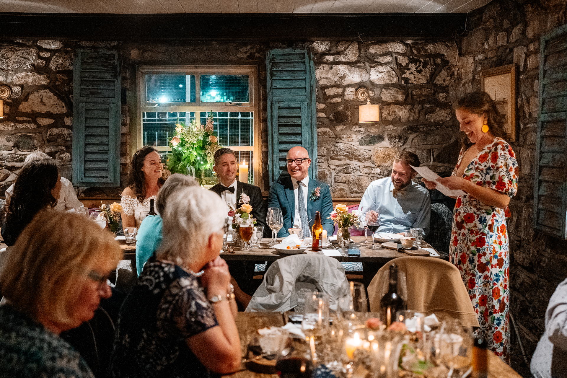 A group of people sitting around a table