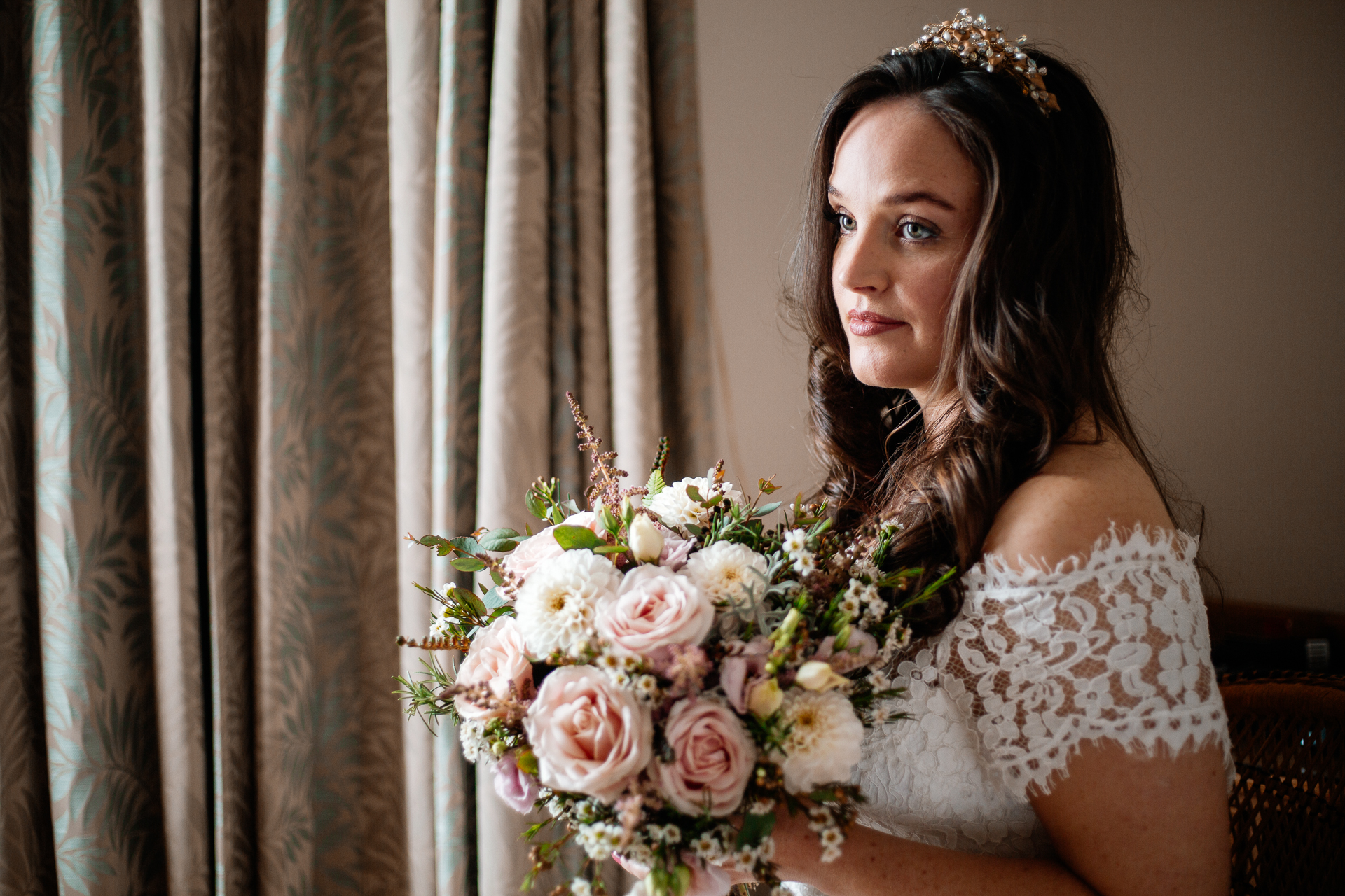 A woman holding a bouquet of flowers